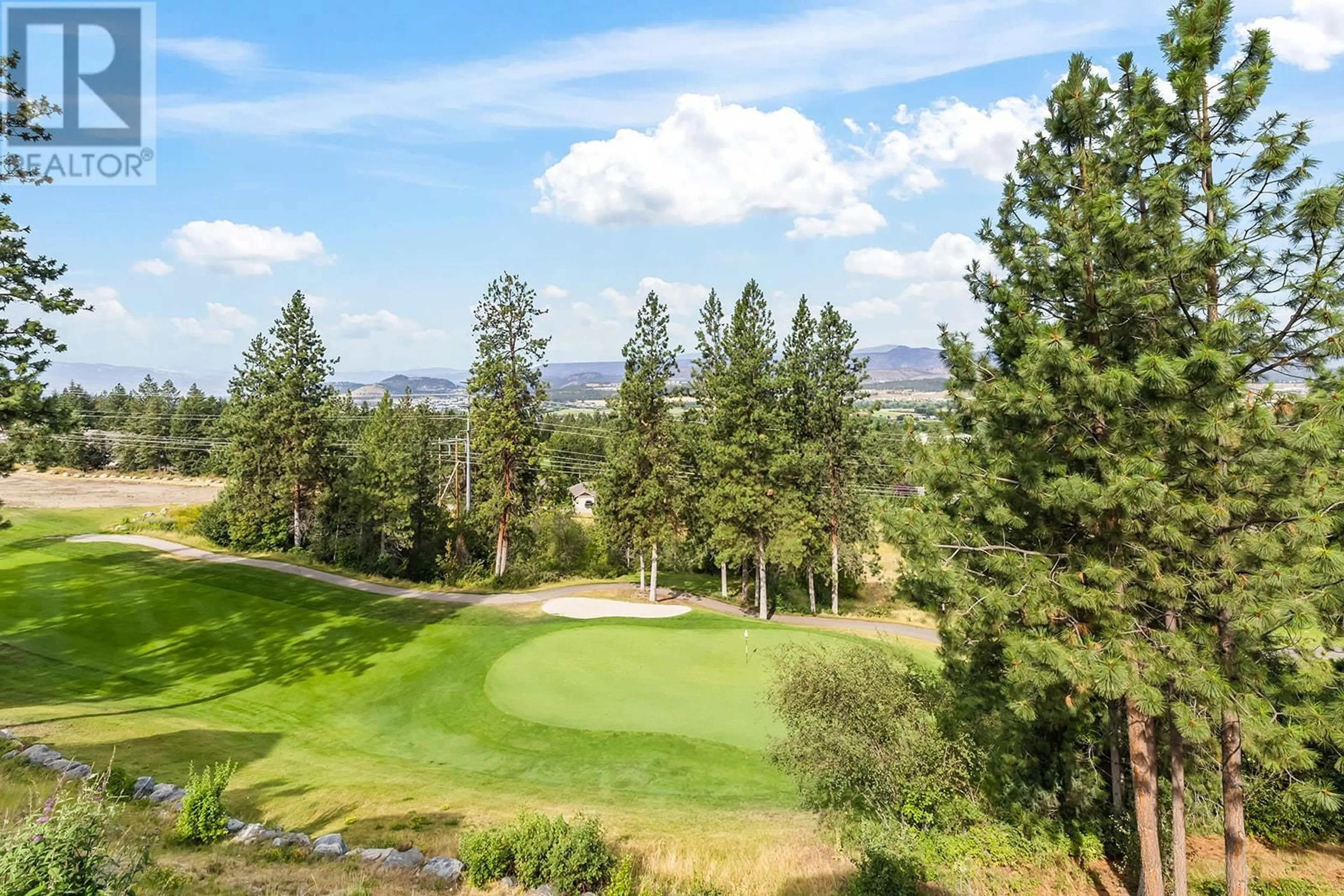 A pic from outside/outdoor area/front of a property/back of a property/a pic from drone, unknown for 5318 TRICKLE CREEK DRIVE, Kelowna British Columbia V1X8C7