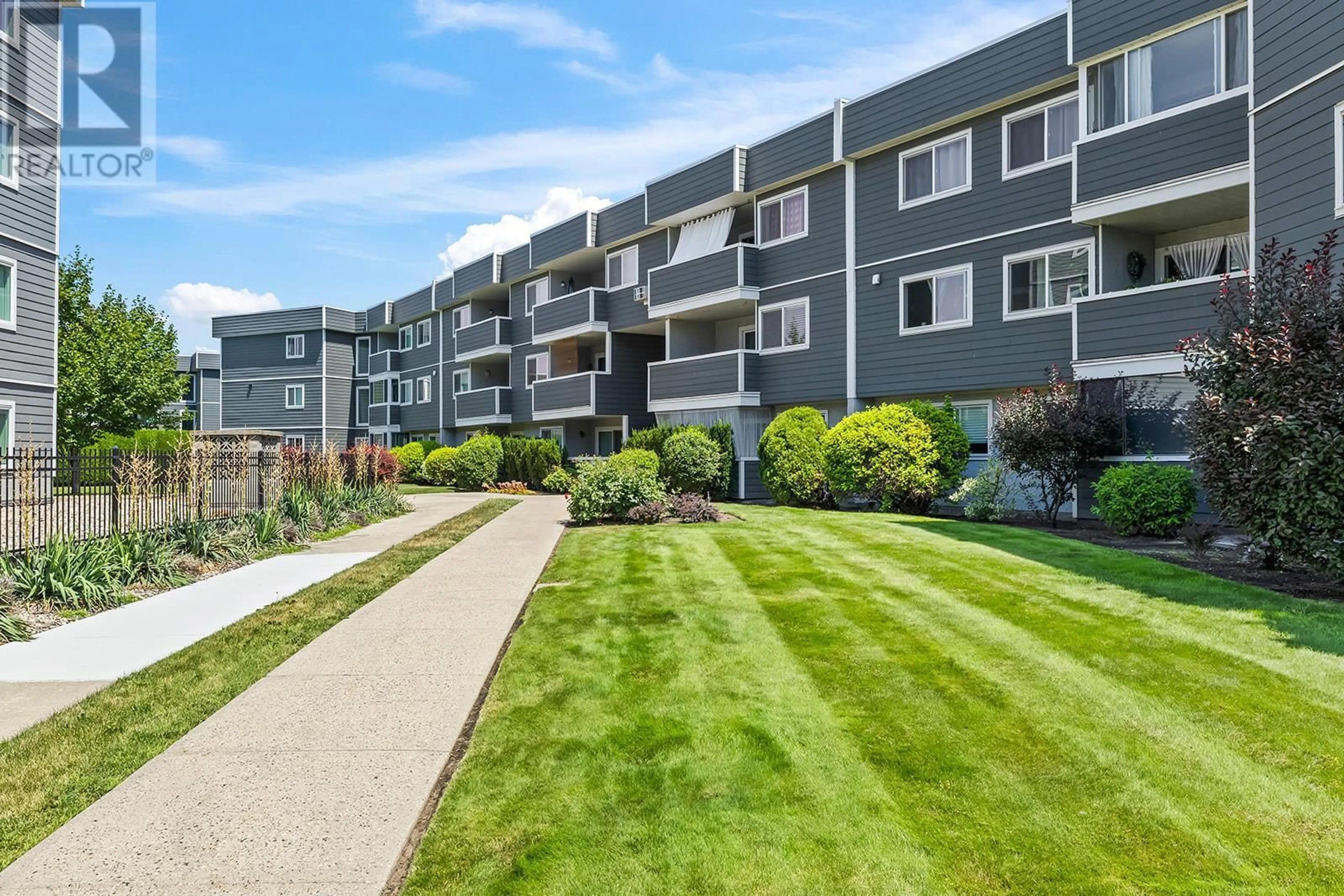 A pic from outside/outdoor area/front of a property/back of a property/a pic from drone, street for 329 - 495 ALL STAR COURT, Kelowna British Columbia V1X5N7