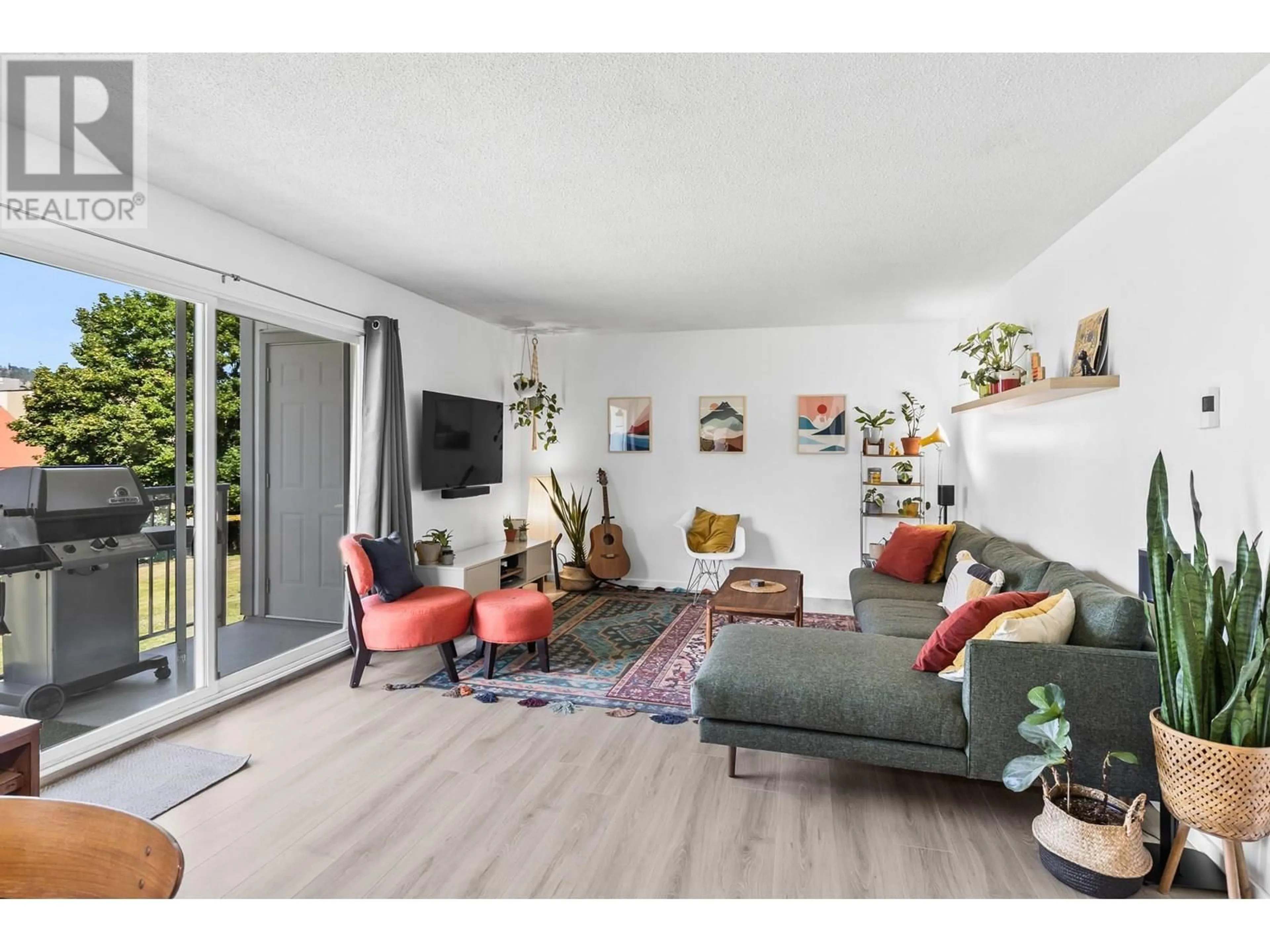 Living room with furniture, unknown for 210 - 875 BADKE ROAD, Kelowna British Columbia V1W5Z5