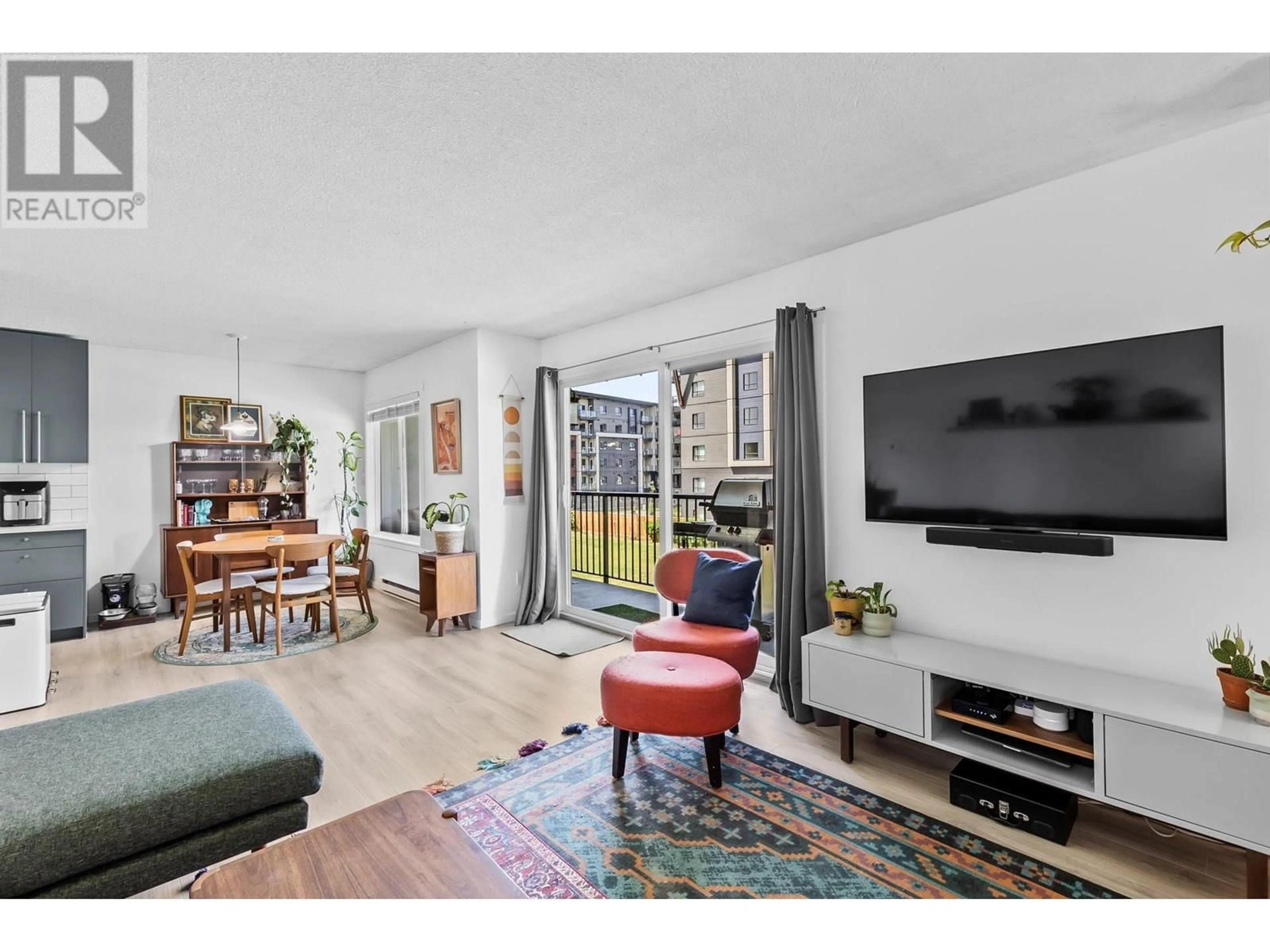 Living room with furniture, unknown for 210 - 875 BADKE ROAD, Kelowna British Columbia V1W5Z5