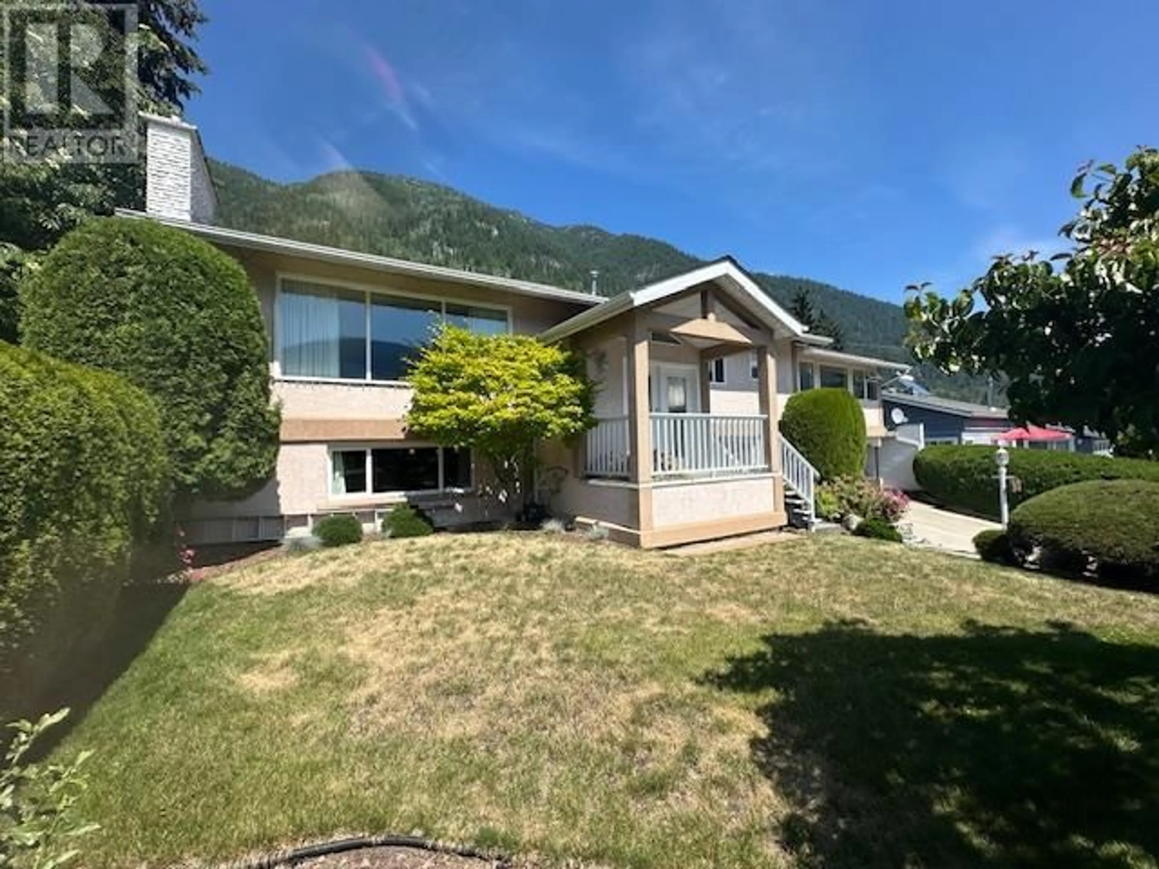 Home with vinyl exterior material, mountain view for 649 JOHNSTONE ROAD, Nelson British Columbia V1L6H8