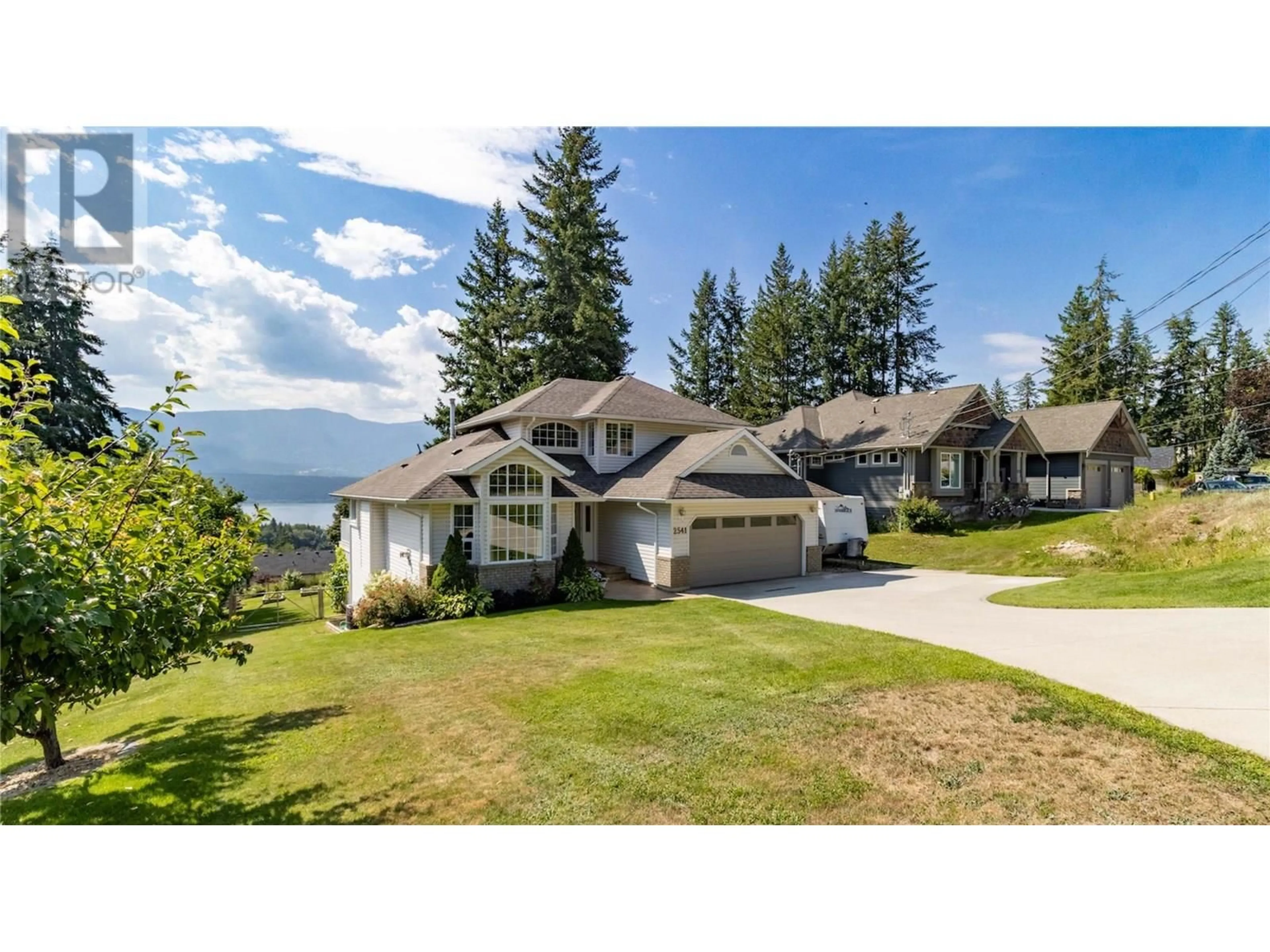A pic from outside/outdoor area/front of a property/back of a property/a pic from drone, water/lake/river/ocean view for 2541 25 STREET NORTHEAST, Salmon Arm British Columbia V1E2Z7