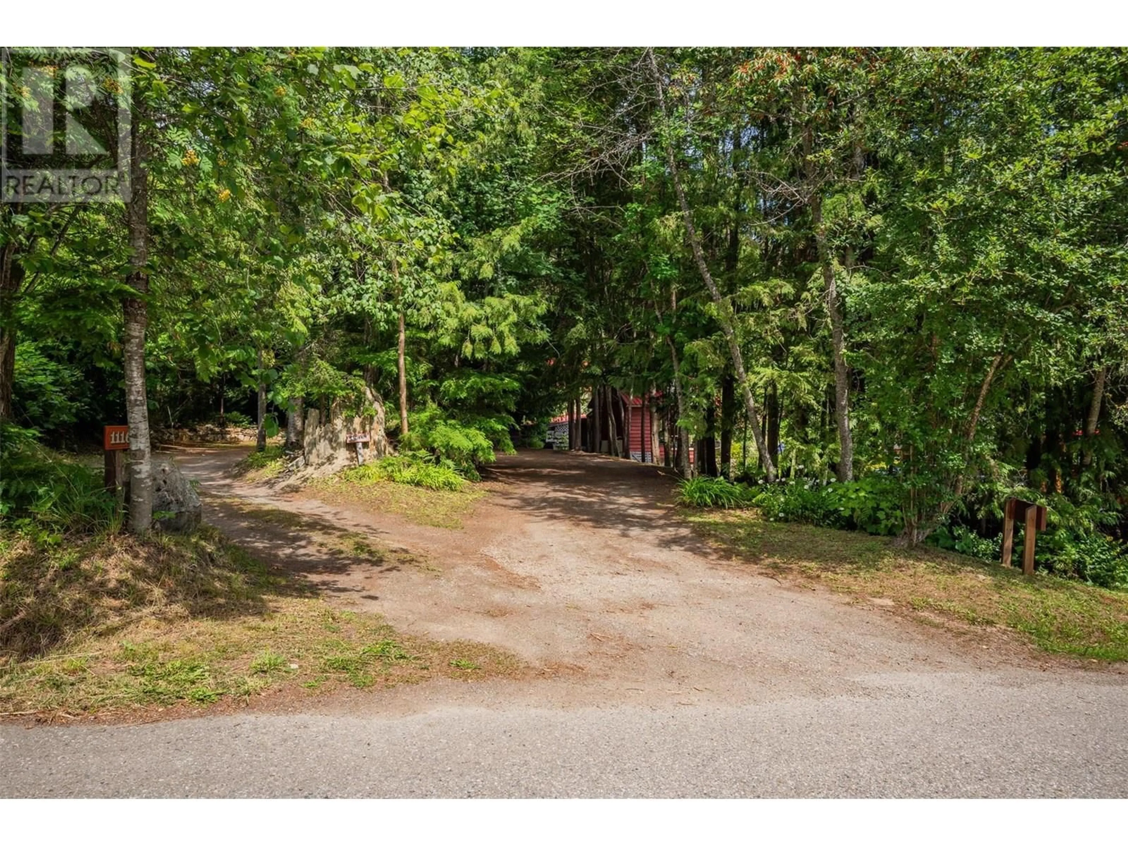 A pic from outside/outdoor area/front of a property/back of a property/a pic from drone, forest/trees view for 1116 C AVENUE, Kaslo British Columbia V0G1M0