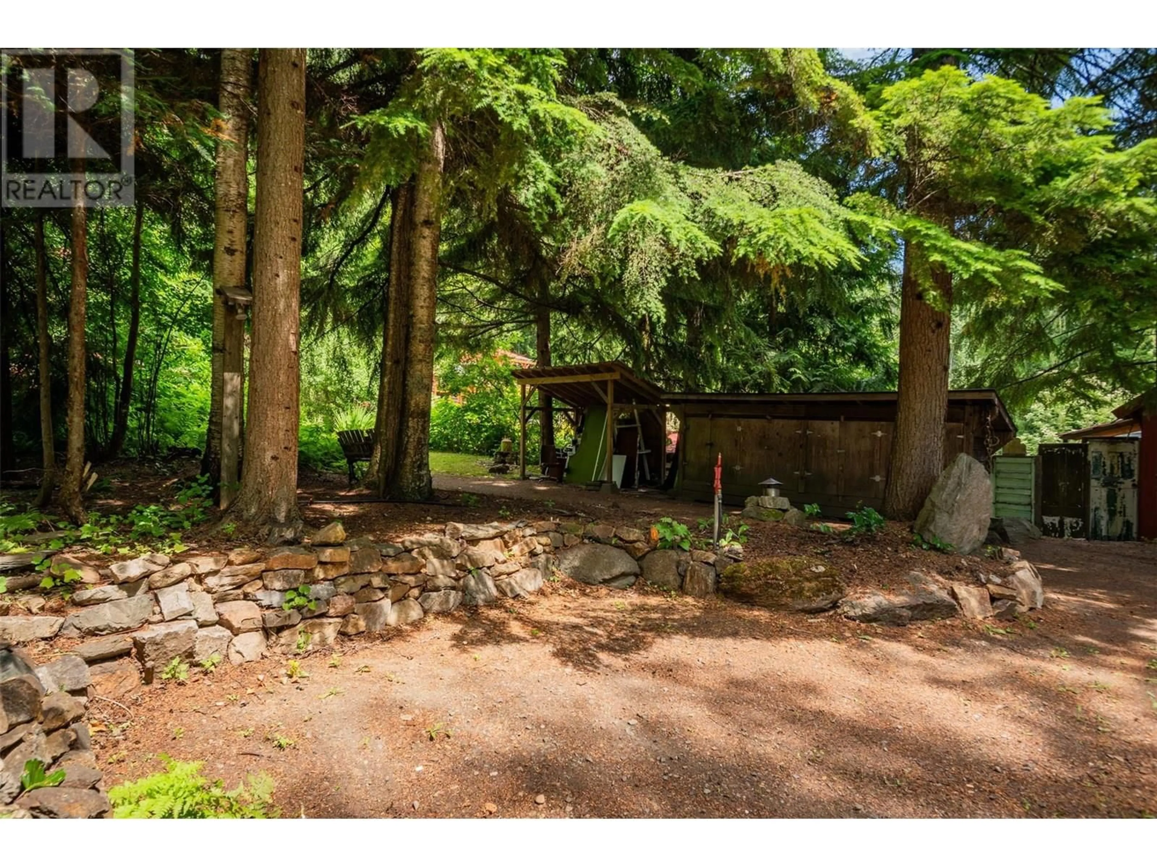 A pic from outside/outdoor area/front of a property/back of a property/a pic from drone, forest/trees view for 1116 C AVENUE, Kaslo British Columbia V0G1M0