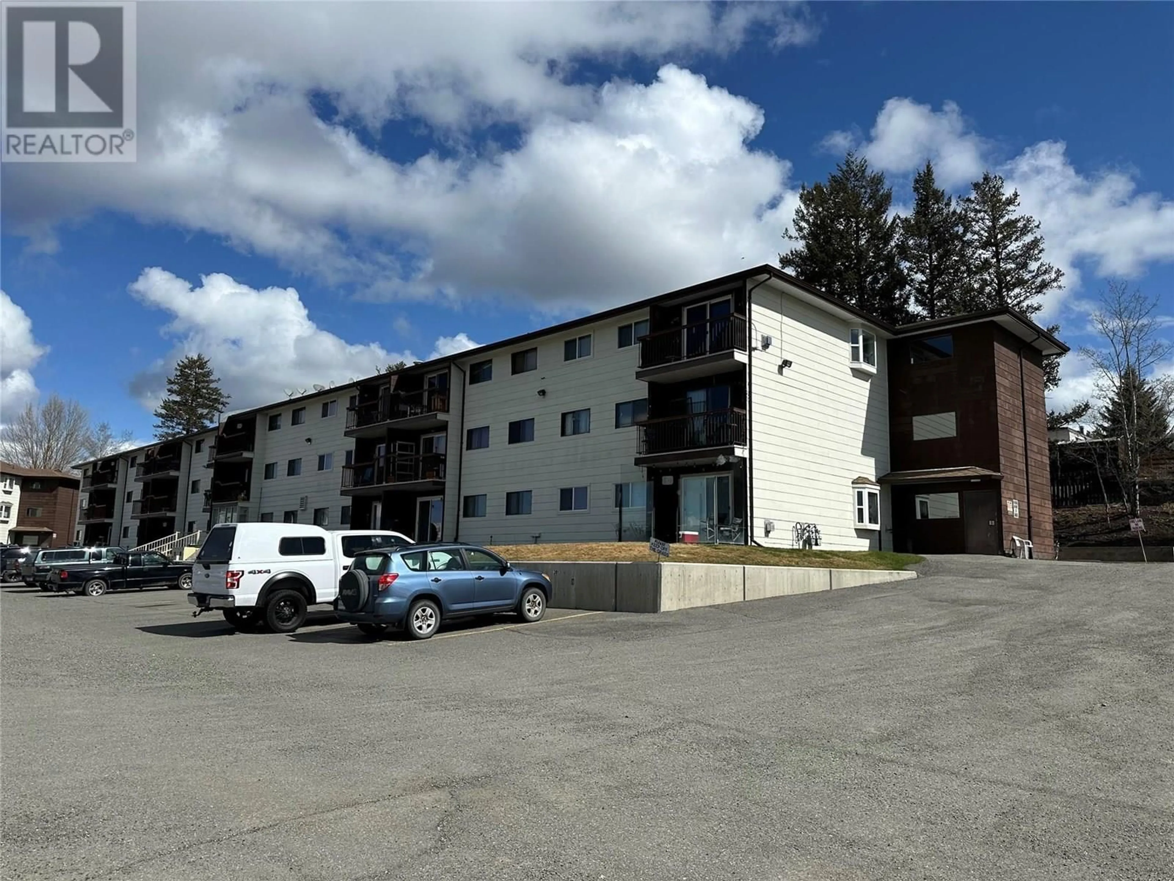 A pic from outside/outdoor area/front of a property/back of a property/a pic from drone, building for 217 - 279 ALDER DRIVE, Logan Lake British Columbia V0K1W0