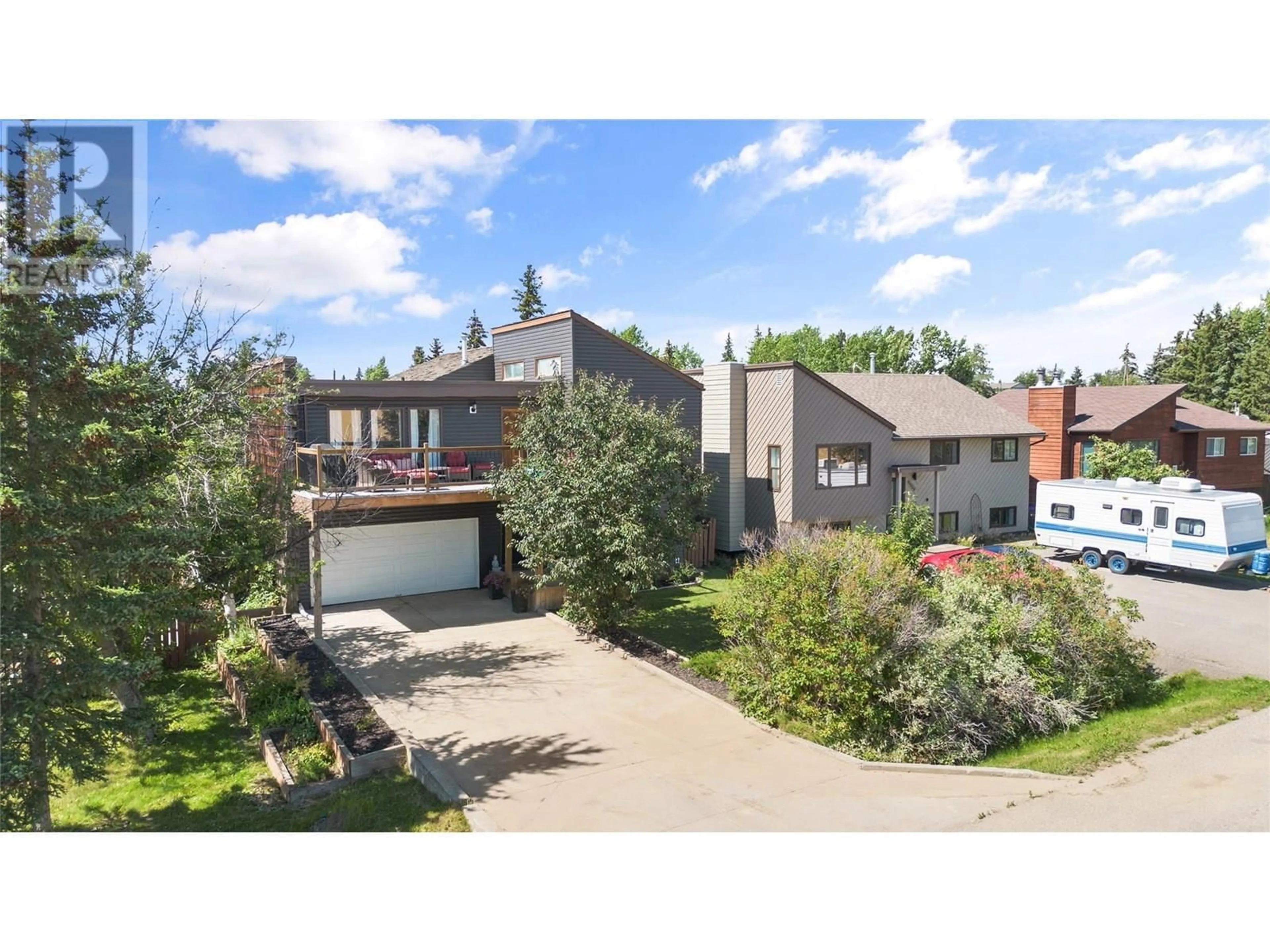 A pic from outside/outdoor area/front of a property/back of a property/a pic from drone, street for 9913 2 STREET, Dawson Creek British Columbia V1G3L1