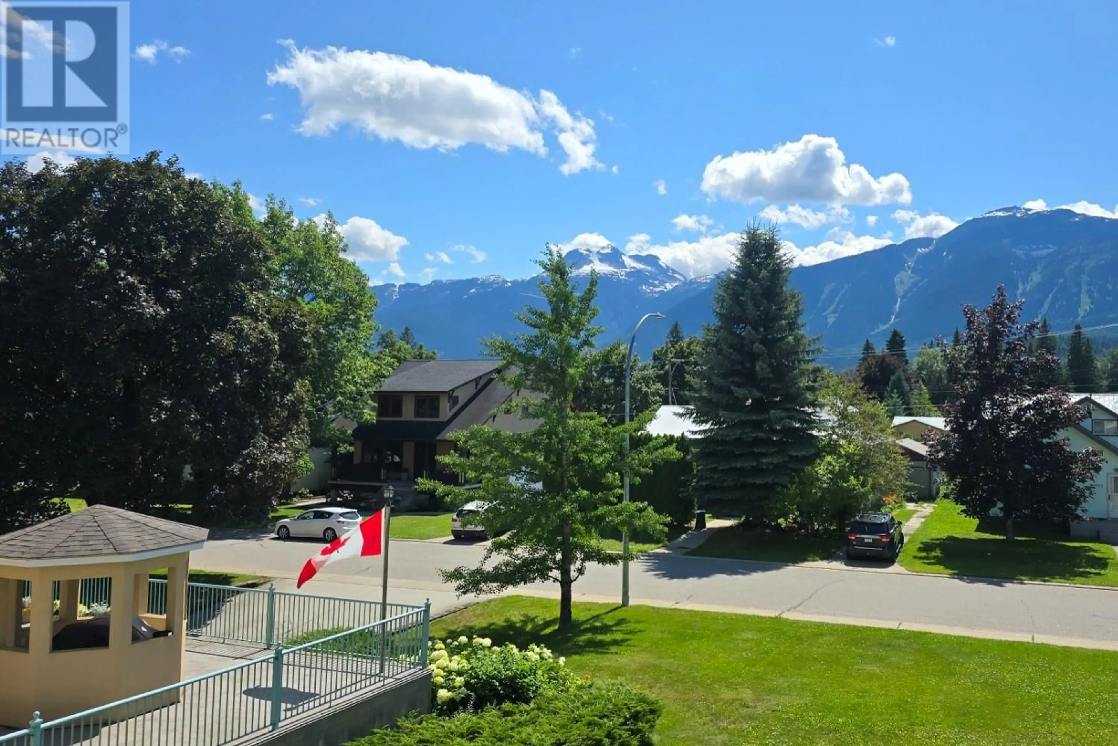 A pic from outside/outdoor area/front of a property/back of a property/a pic from drone, mountain view for 206 - 311 SIXTH STREET EAST, Revelstoke British Columbia V0E2S0