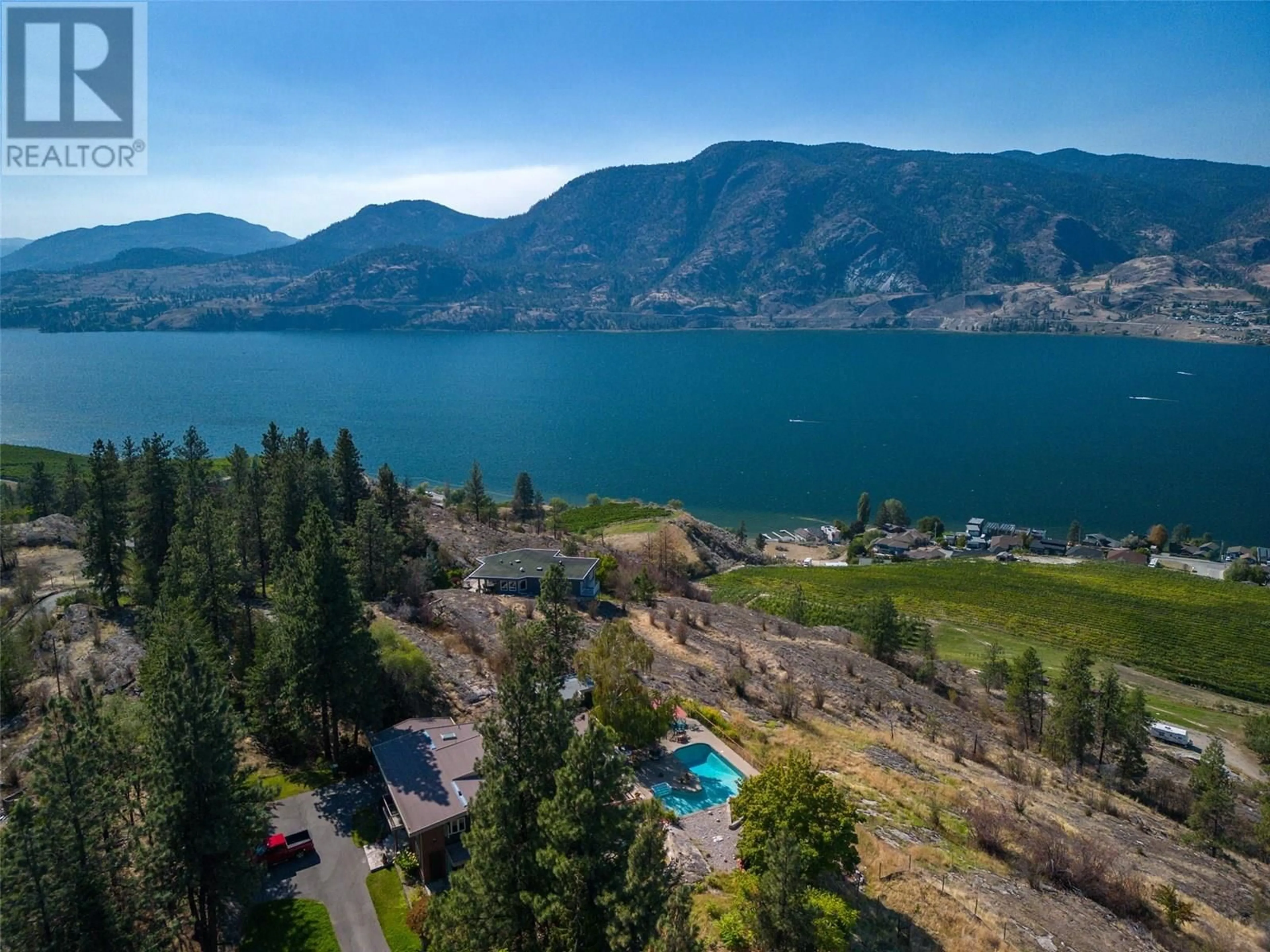 A pic from outside/outdoor area/front of a property/back of a property/a pic from drone, water/lake/river/ocean view for 4085 VALLEYVIEW ROAD, Penticton British Columbia V2A8V8