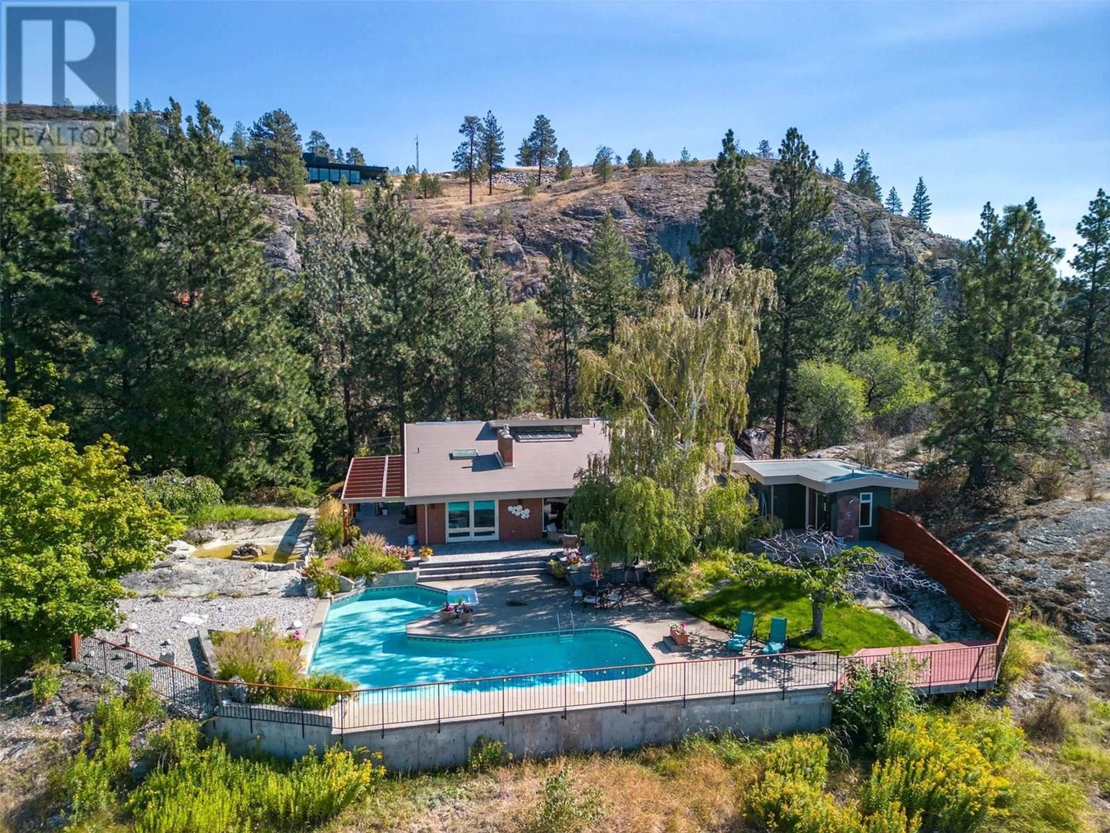 A pic from outside/outdoor area/front of a property/back of a property/a pic from drone, water/lake/river/ocean view for 4085 VALLEYVIEW ROAD, Penticton British Columbia V2A8V8