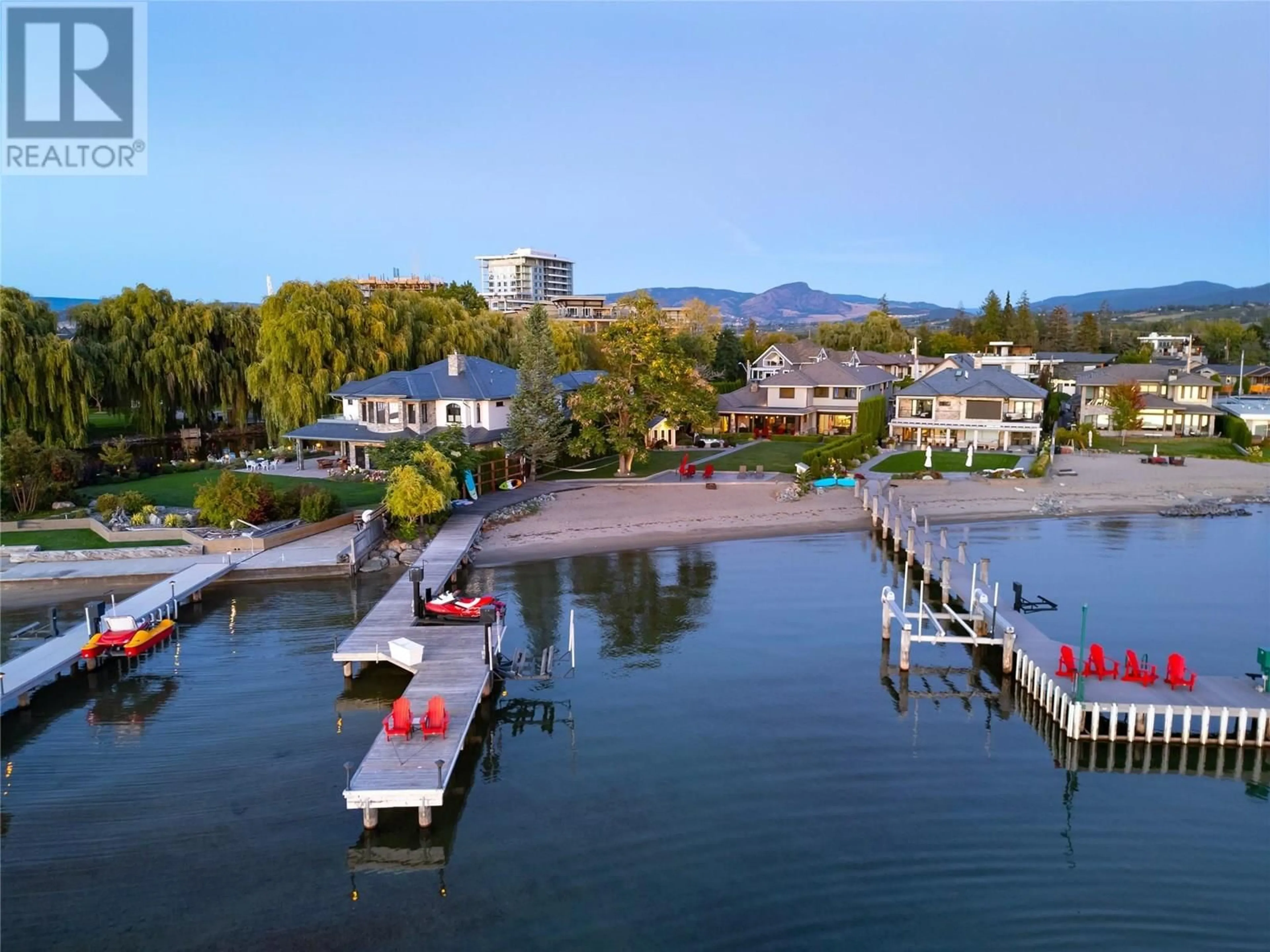 A pic from outside/outdoor area/front of a property/back of a property/a pic from drone, water/lake/river/ocean view for 3908 BLUEBIRD ROAD, Kelowna British Columbia V1W1X6