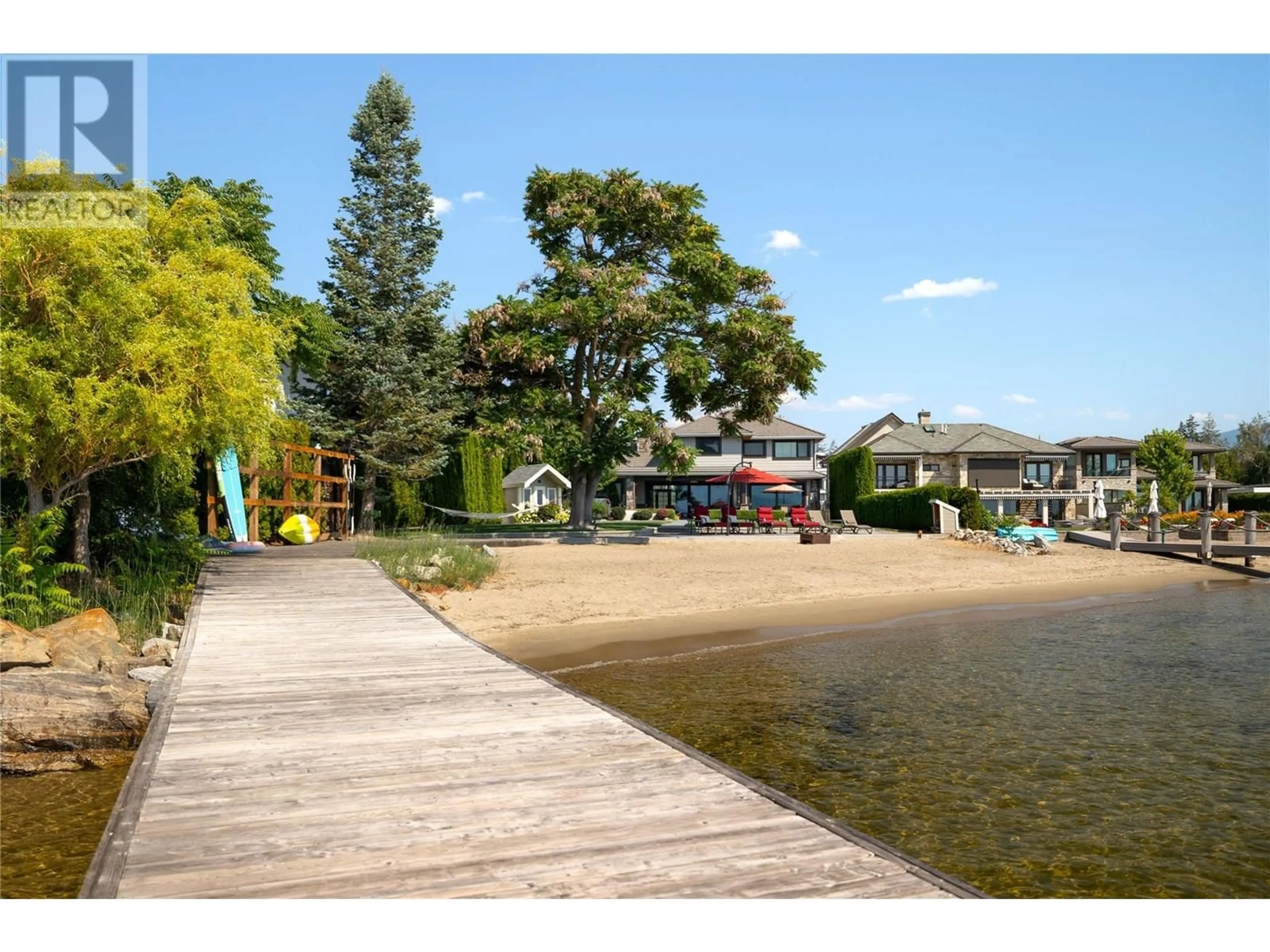 A pic from outside/outdoor area/front of a property/back of a property/a pic from drone, water/lake/river/ocean view for 3908 BLUEBIRD ROAD, Kelowna British Columbia V1W1X6
