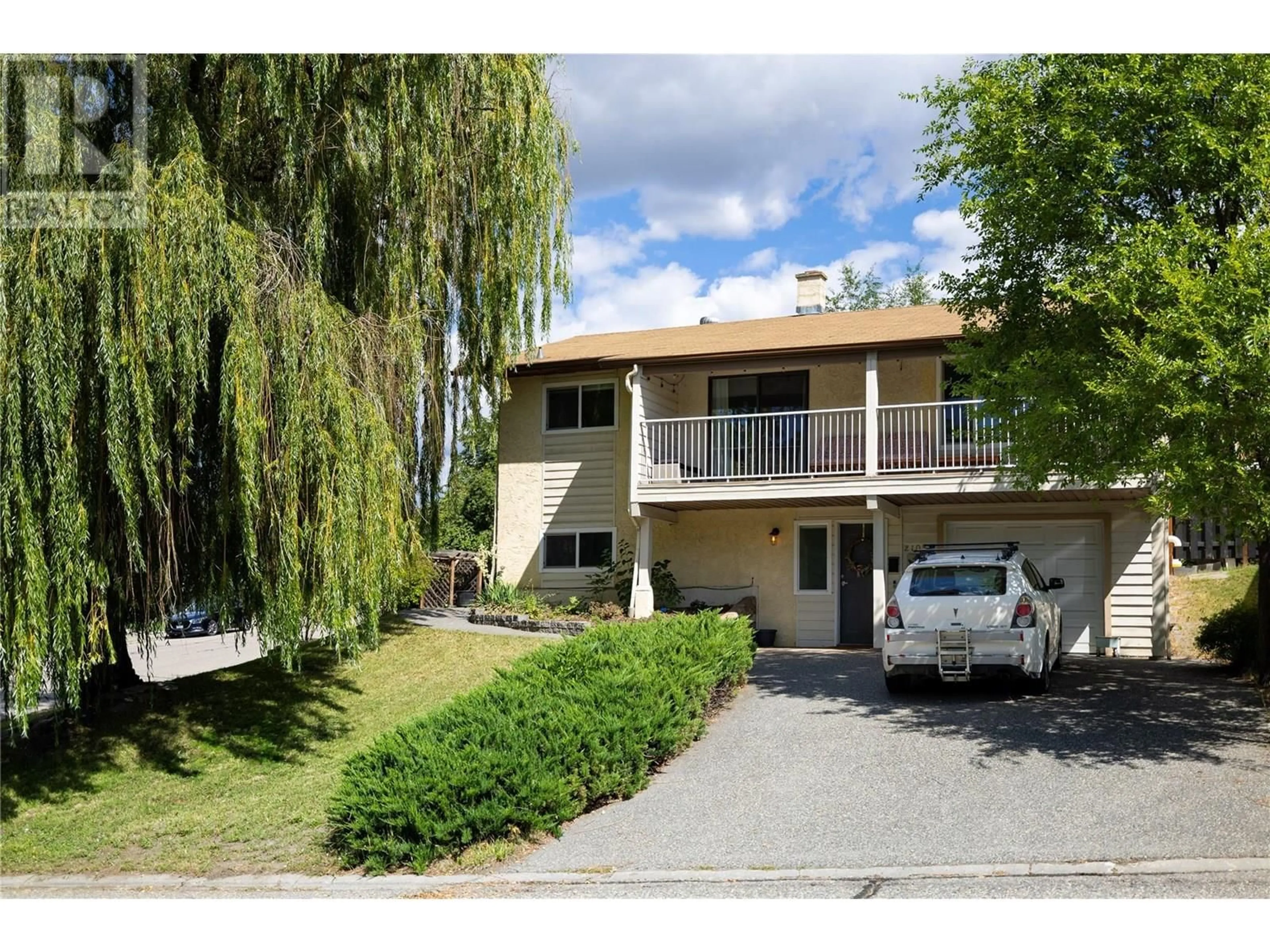 A pic from outside/outdoor area/front of a property/back of a property/a pic from drone, street for 2105 19 AVENUE, Vernon British Columbia V1T7L7