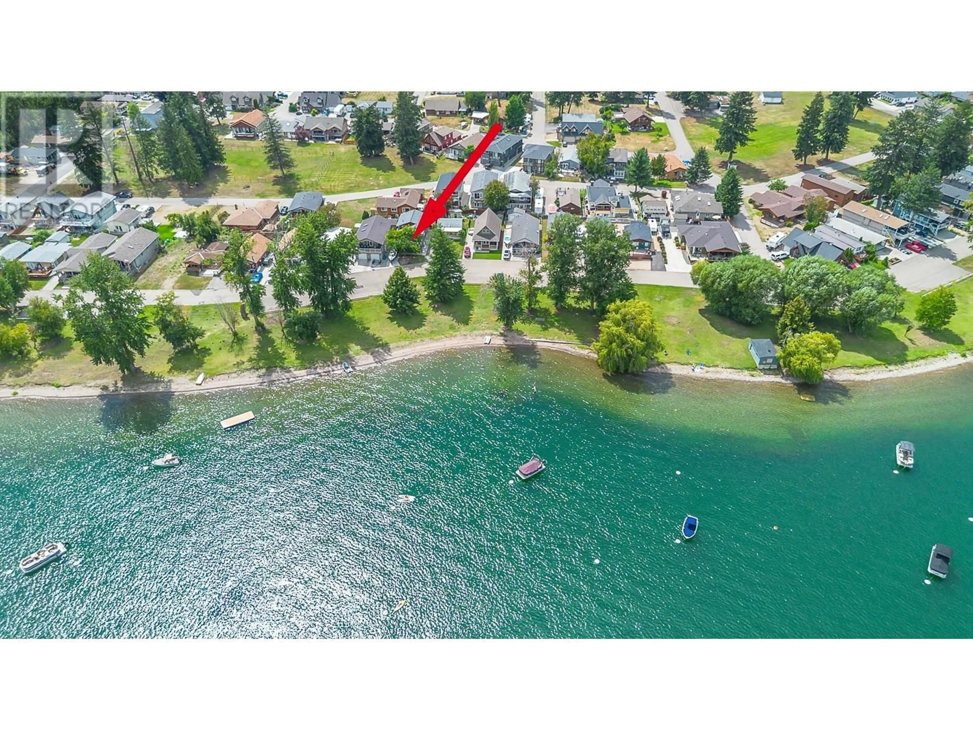 A pic from outside/outdoor area/front of a property/back of a property/a pic from drone, water/lake/river/ocean view for 42 LAKESHORE DRIVE, Vernon British Columbia V1H2A1