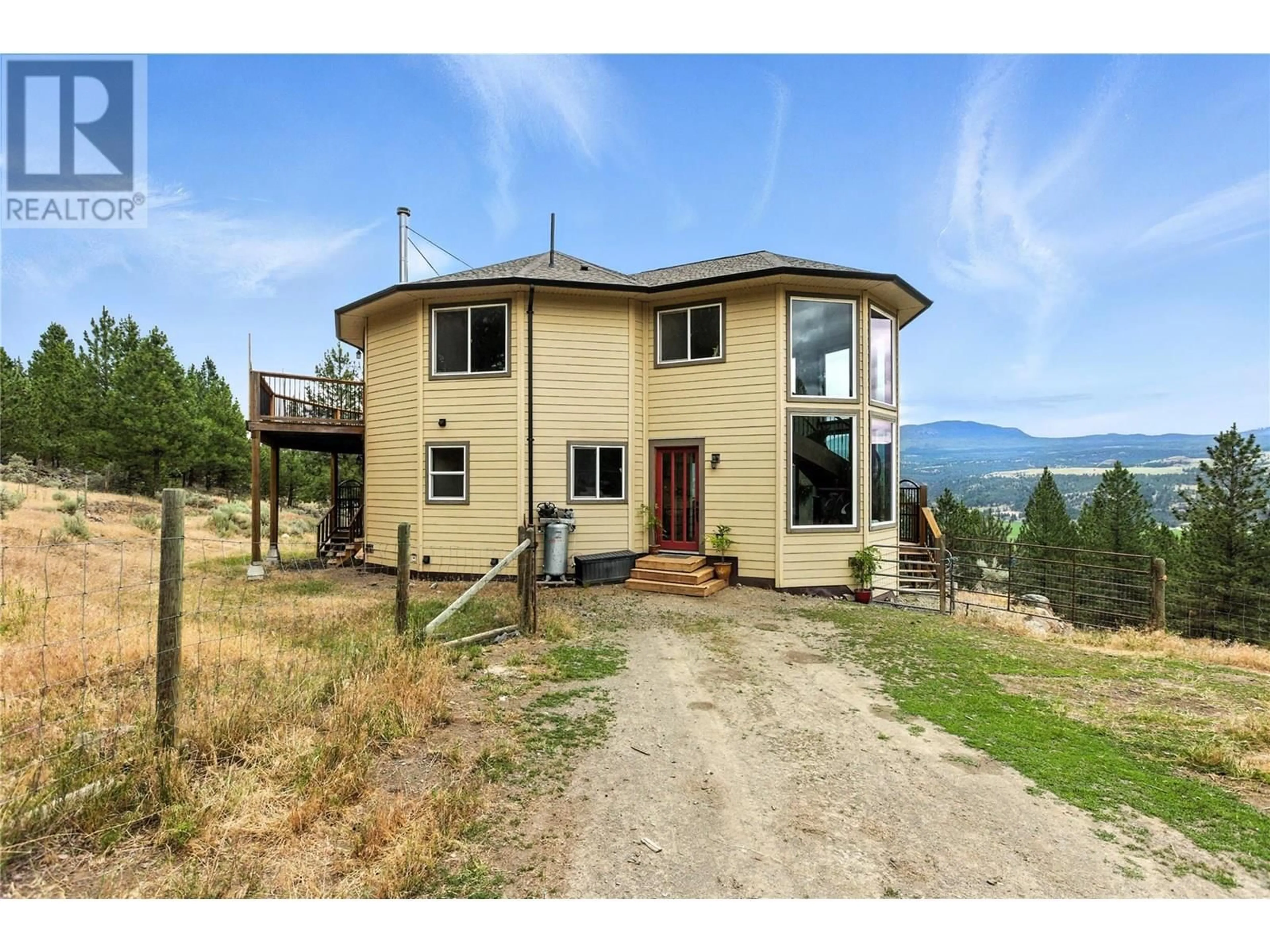 A pic from outside/outdoor area/front of a property/back of a property/a pic from drone, mountain view for 4377 SHUSWAP ROAD, Kamloops British Columbia V0E2P0