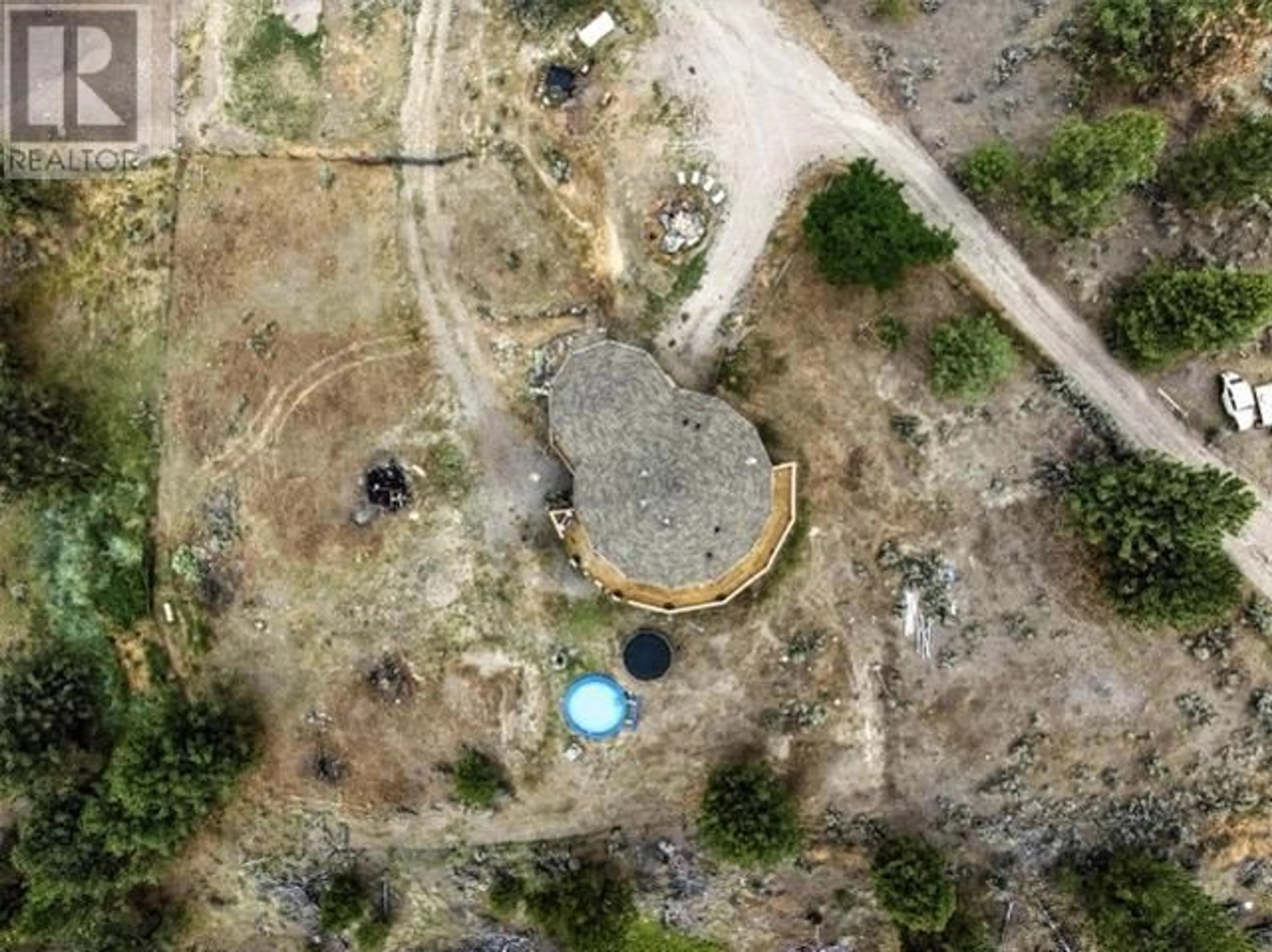 A pic from outside/outdoor area/front of a property/back of a property/a pic from drone, unknown for 4377 SHUSWAP ROAD, Kamloops British Columbia V0E2P0