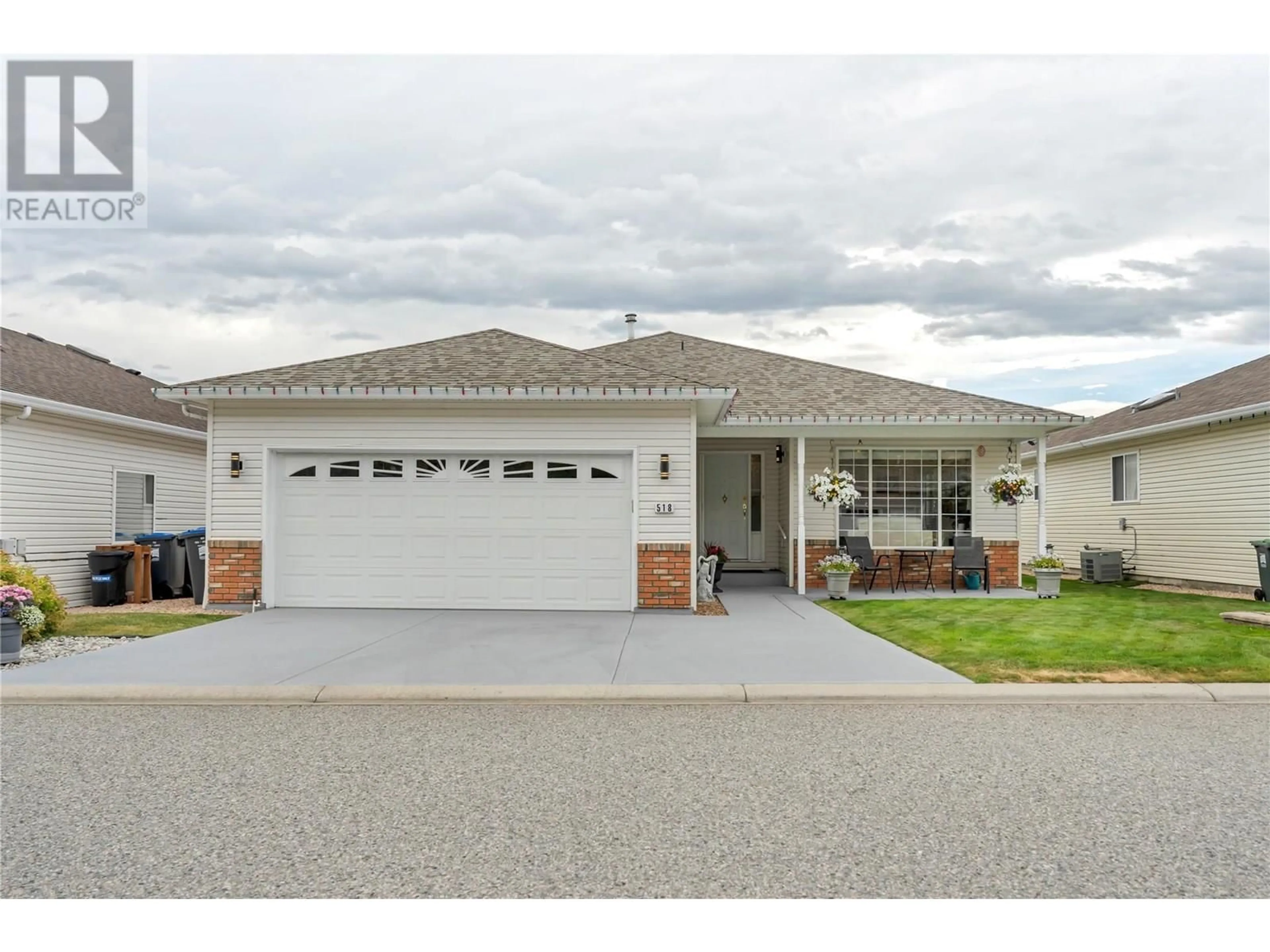 Home with vinyl exterior material, street for 518 RED WING DRIVE, Penticton British Columbia V2A8N7