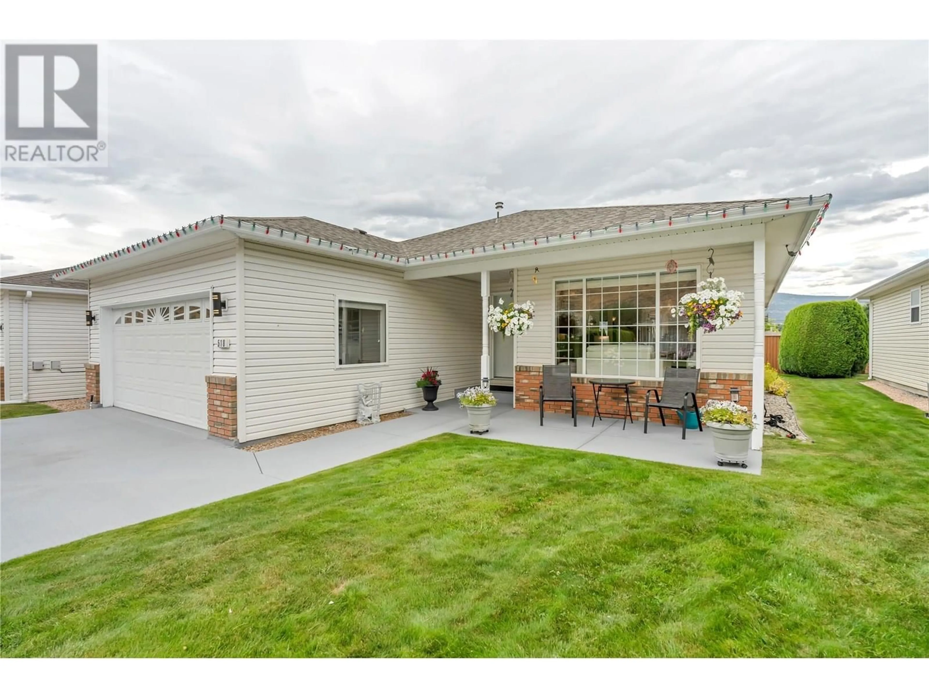 Home with vinyl exterior material, street for 518 RED WING DRIVE, Penticton British Columbia V2A8N7