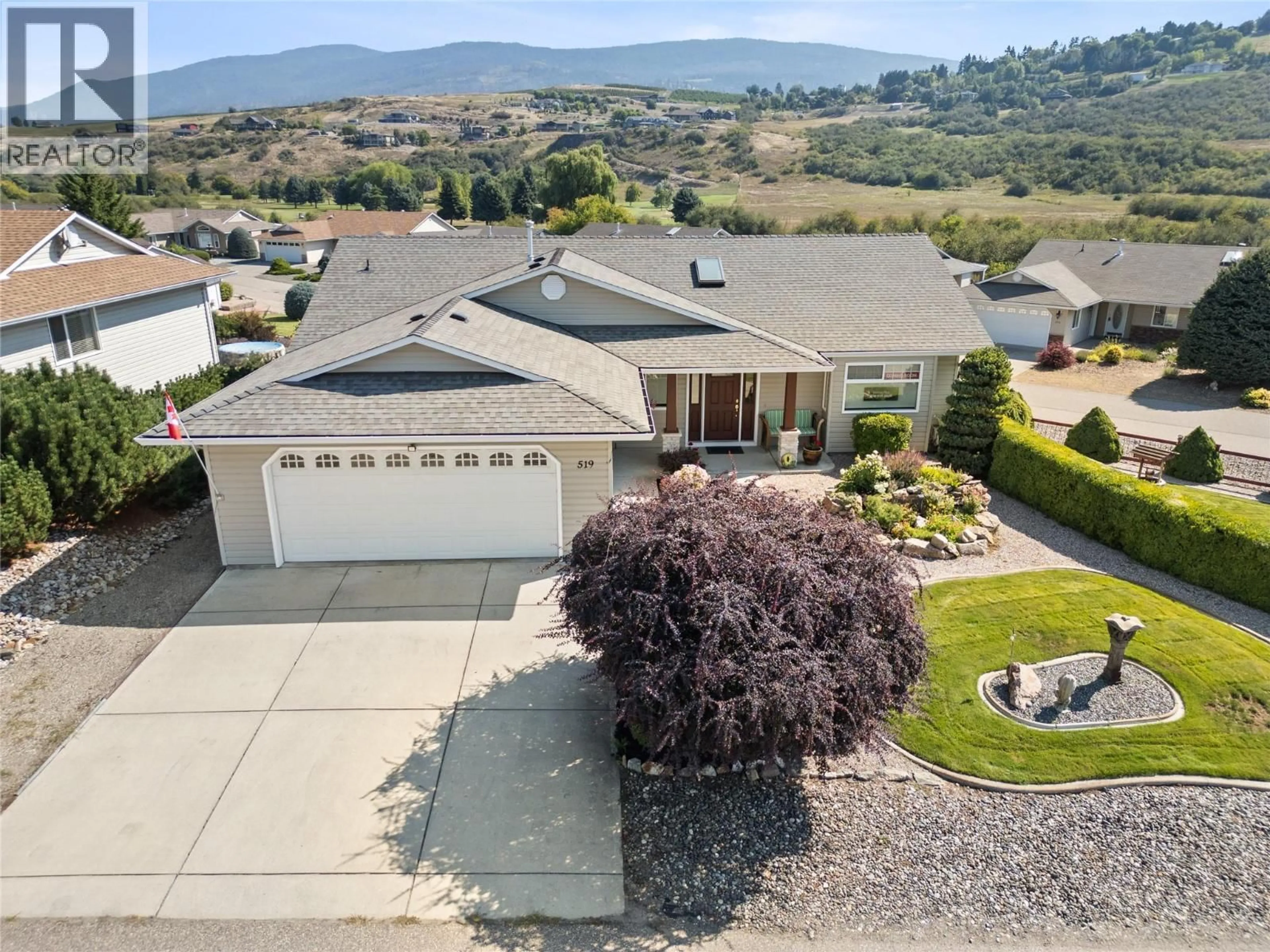 A pic from outside/outdoor area/front of a property/back of a property/a pic from drone, mountain view for 519 5TH STREET, Vernon British Columbia V1H1Z1
