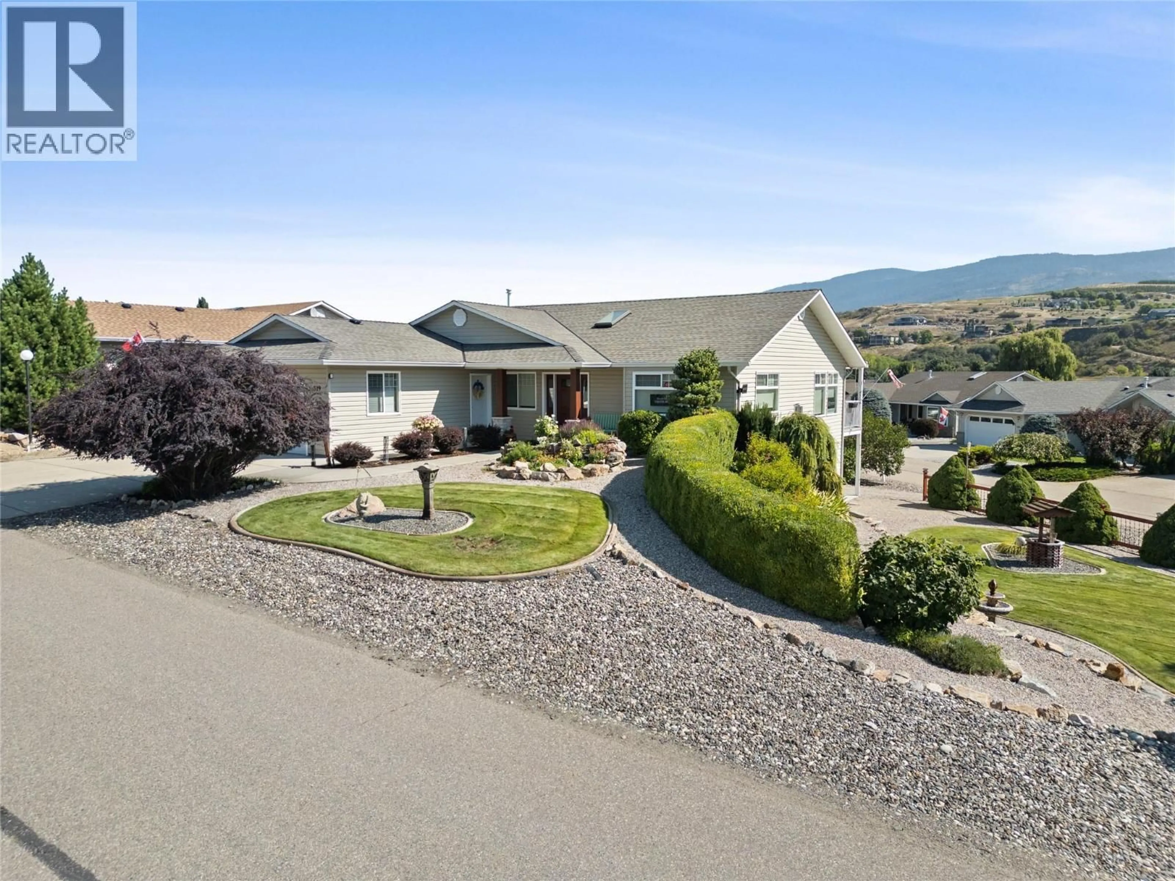 A pic from outside/outdoor area/front of a property/back of a property/a pic from drone, mountain view for 519 5TH STREET, Vernon British Columbia V1H1Z1