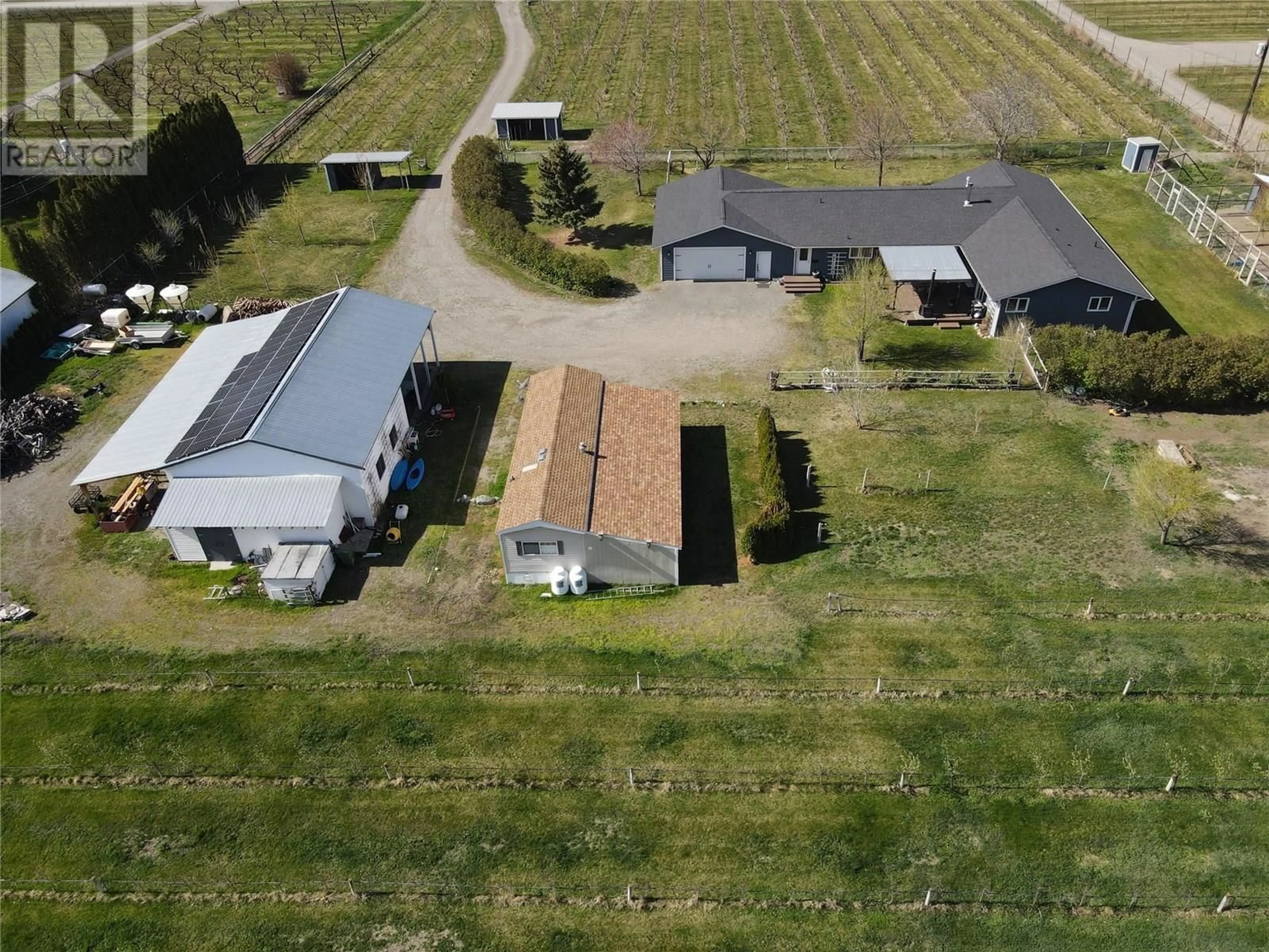 A pic from outside/outdoor area/front of a property/back of a property/a pic from drone, street for 2202 NEWTON ROAD, Cawston British Columbia V0X1C1