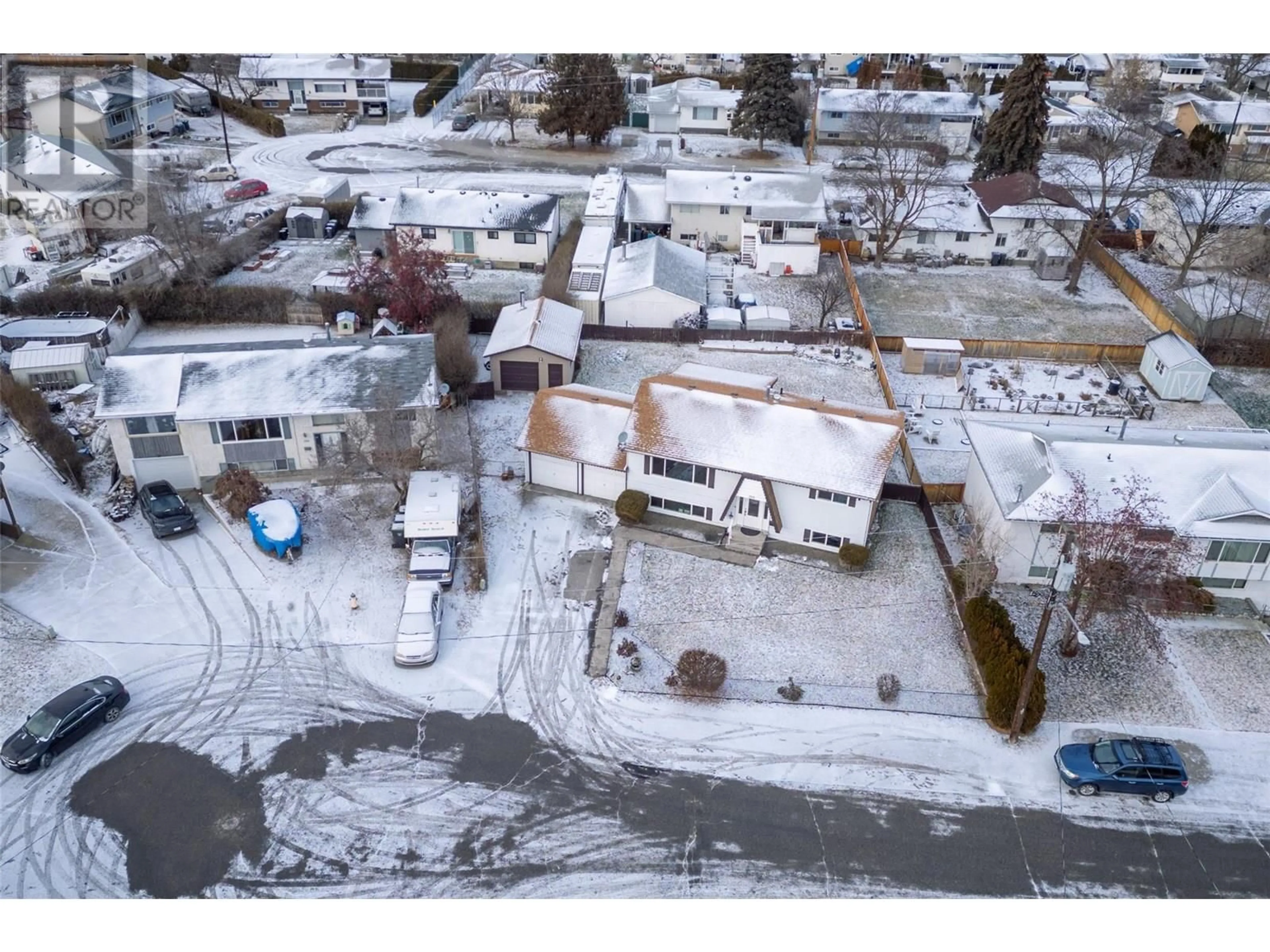 A pic from outside/outdoor area/front of a property/back of a property/a pic from drone, street for 200 JUPITER ROAD, Kelowna British Columbia V1X5W5