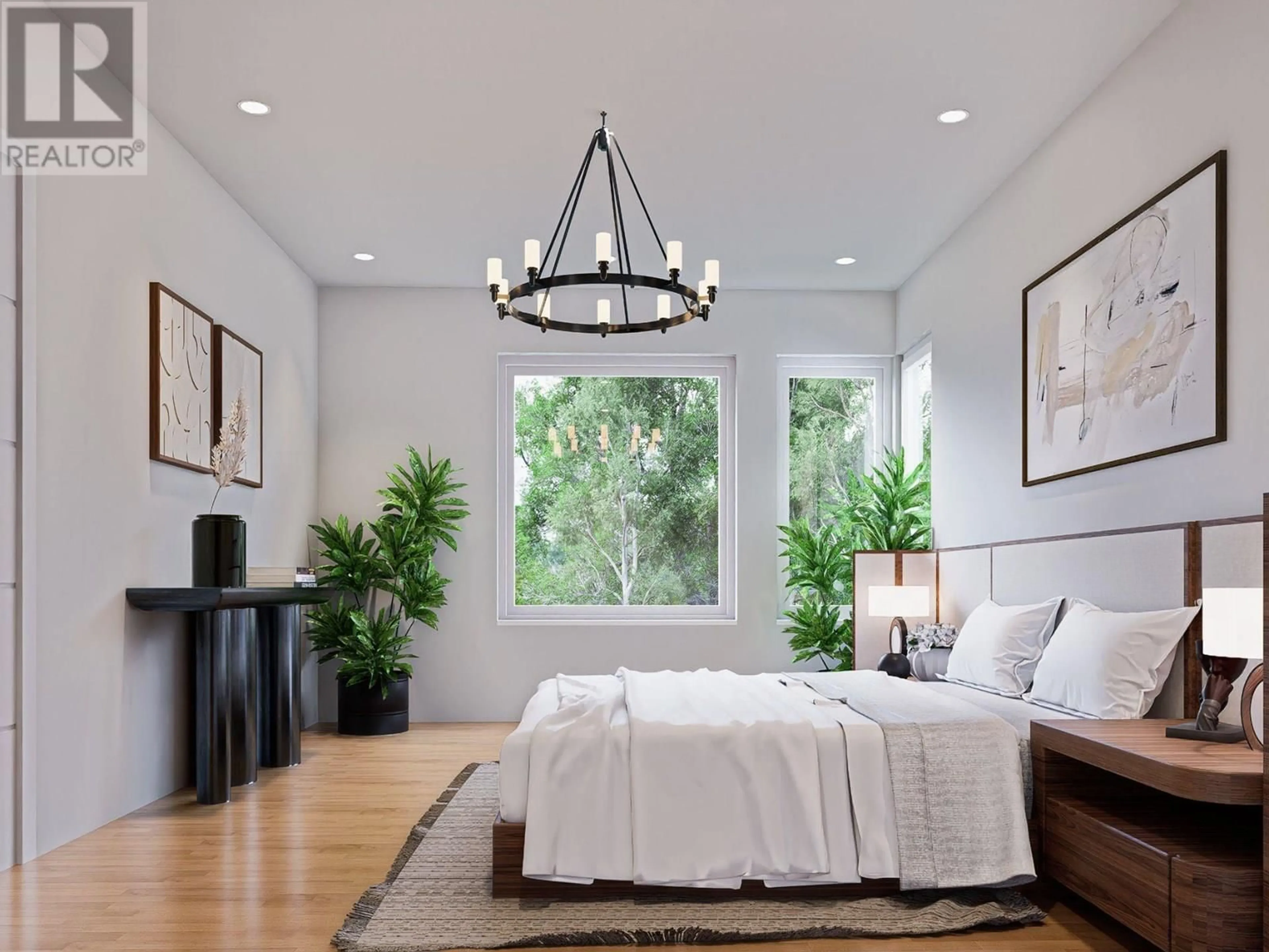 Bedroom with bed, wood/laminate floor for 3 - 781 MARTIN AVENUE, Kelowna British Columbia V1Y6V4
