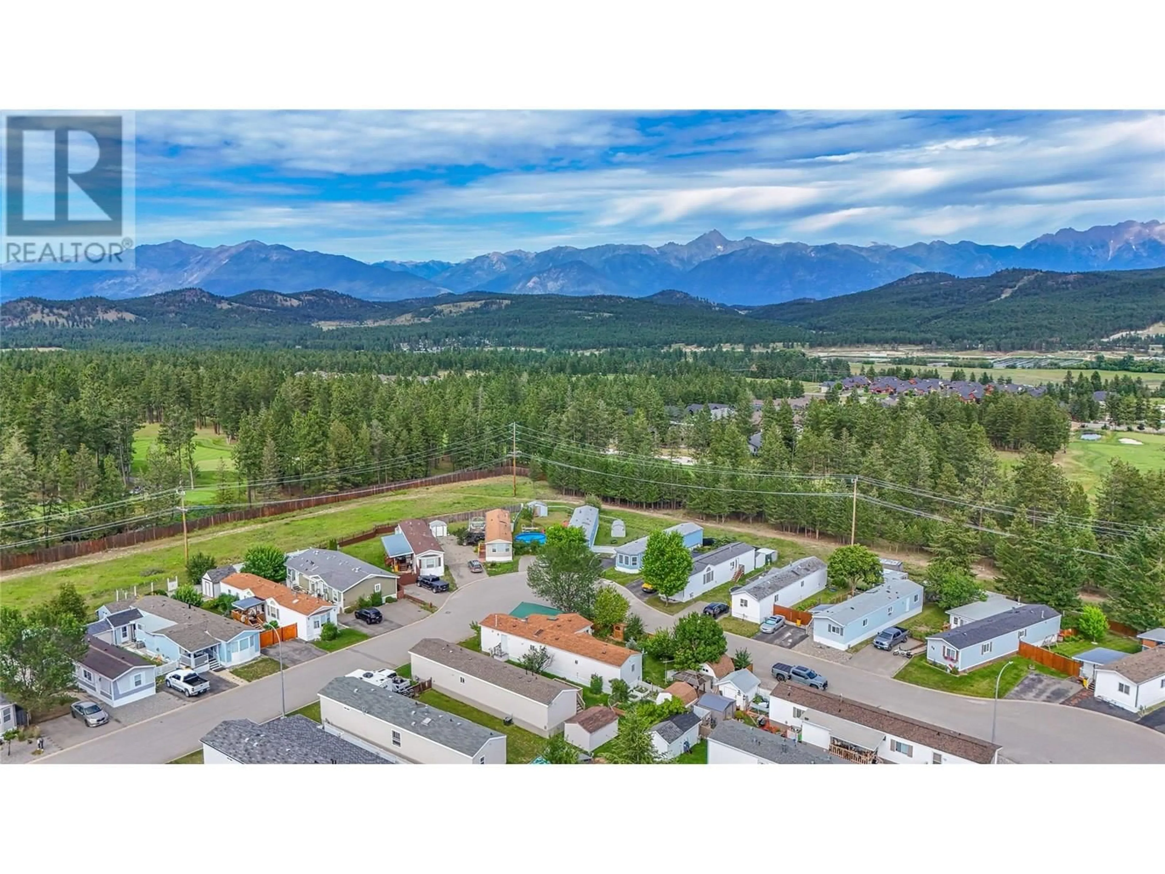 A pic from outside/outdoor area/front of a property/back of a property/a pic from drone, mountain view for 38 - 2424 INDUSTRIAL 2 ROAD, Cranbrook British Columbia V1C6H3