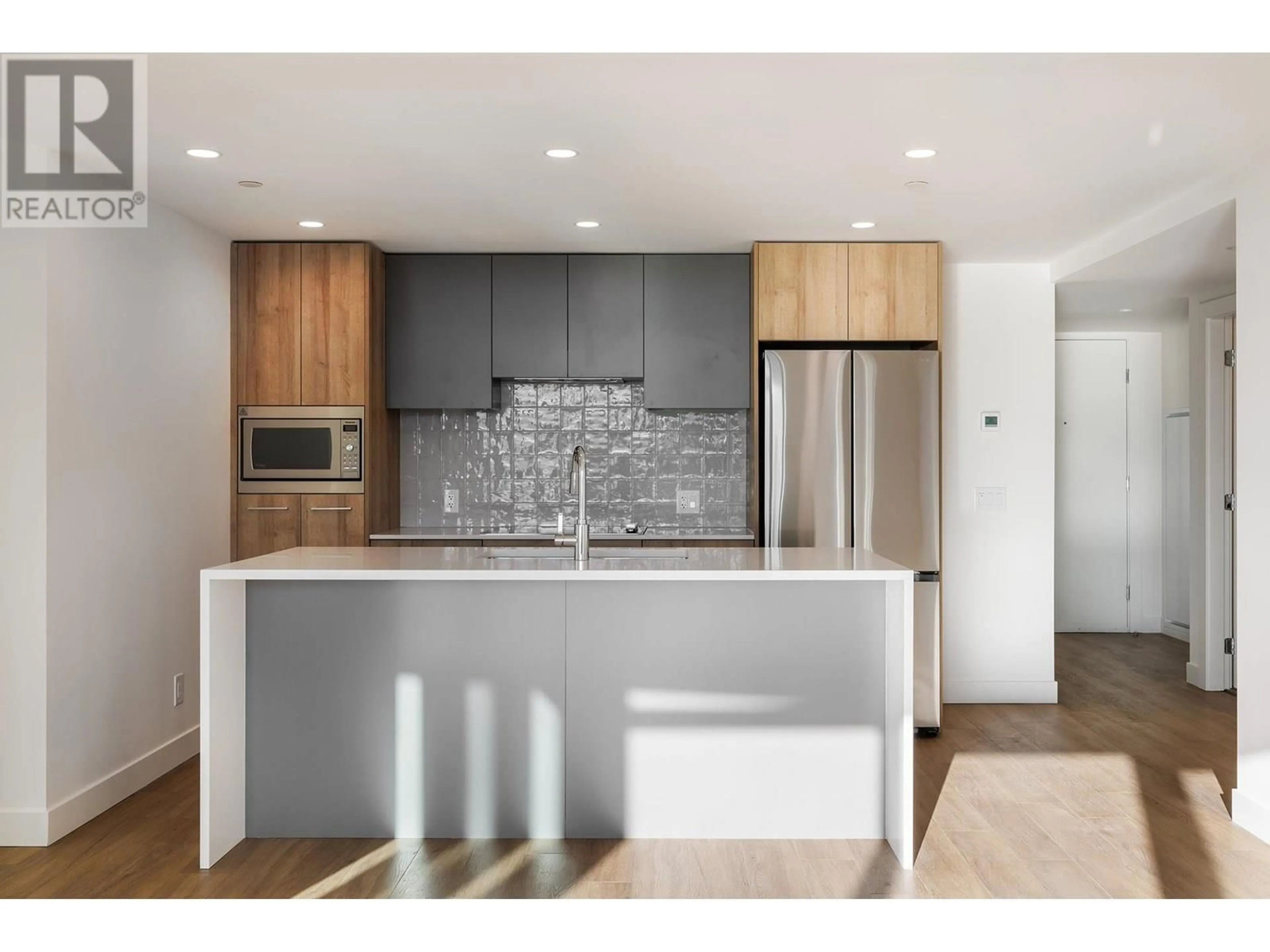 Open concept kitchen, unknown for 909 - 3699 CAPOZZI ROAD, Kelowna British Columbia V1W3L2