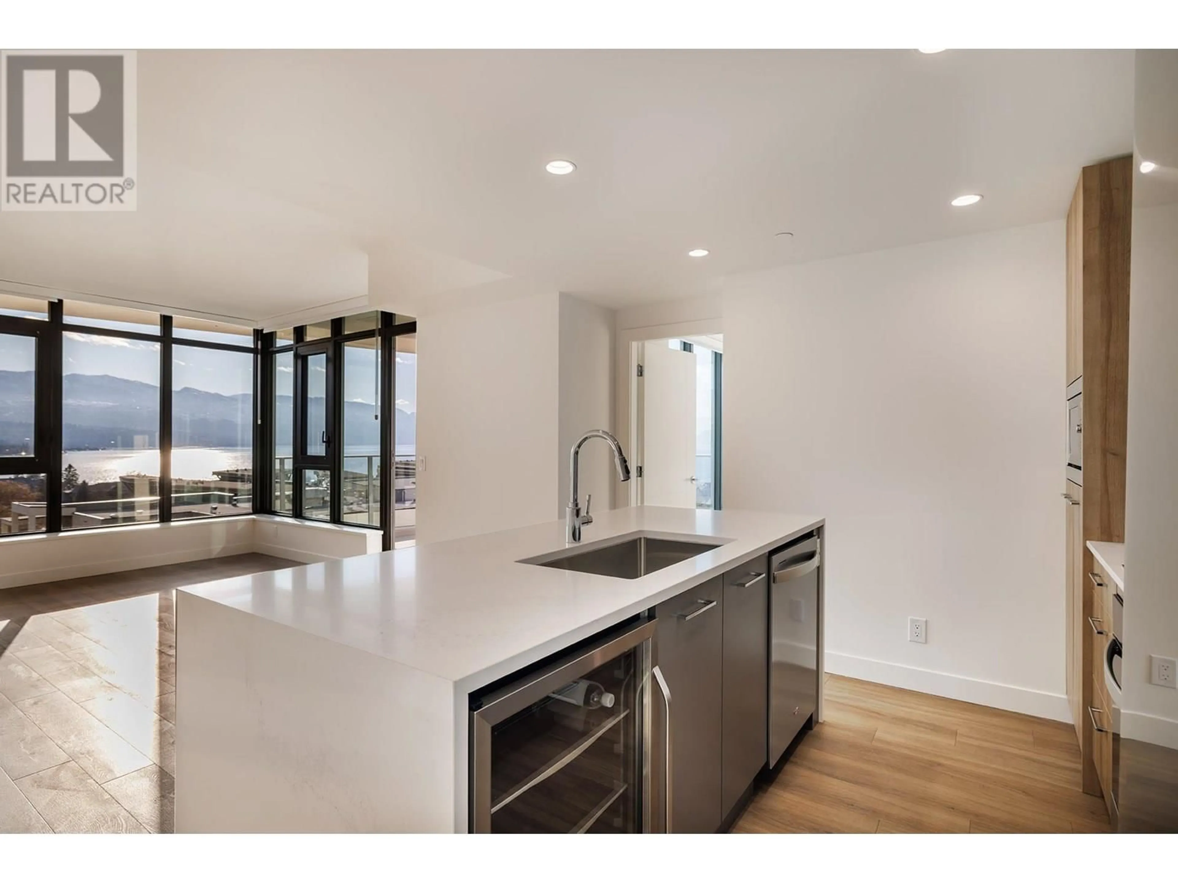 Open concept kitchen, unknown for 909 - 3699 CAPOZZI ROAD, Kelowna British Columbia V1W3L2