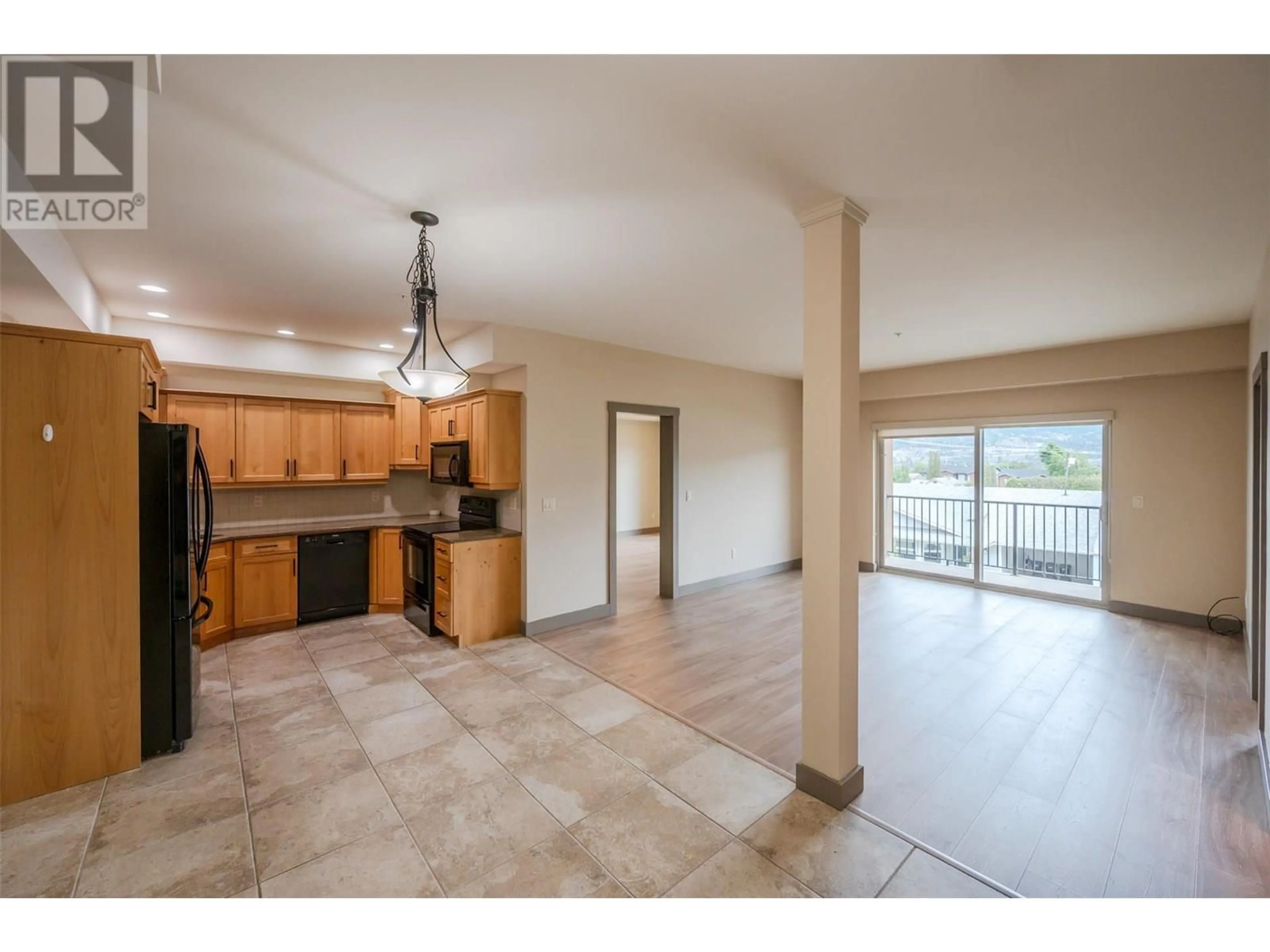 Open concept kitchen, ceramic/tile floor for 203 - 873 FORESTBROOK DRIVE, Penticton British Columbia V2A2E9