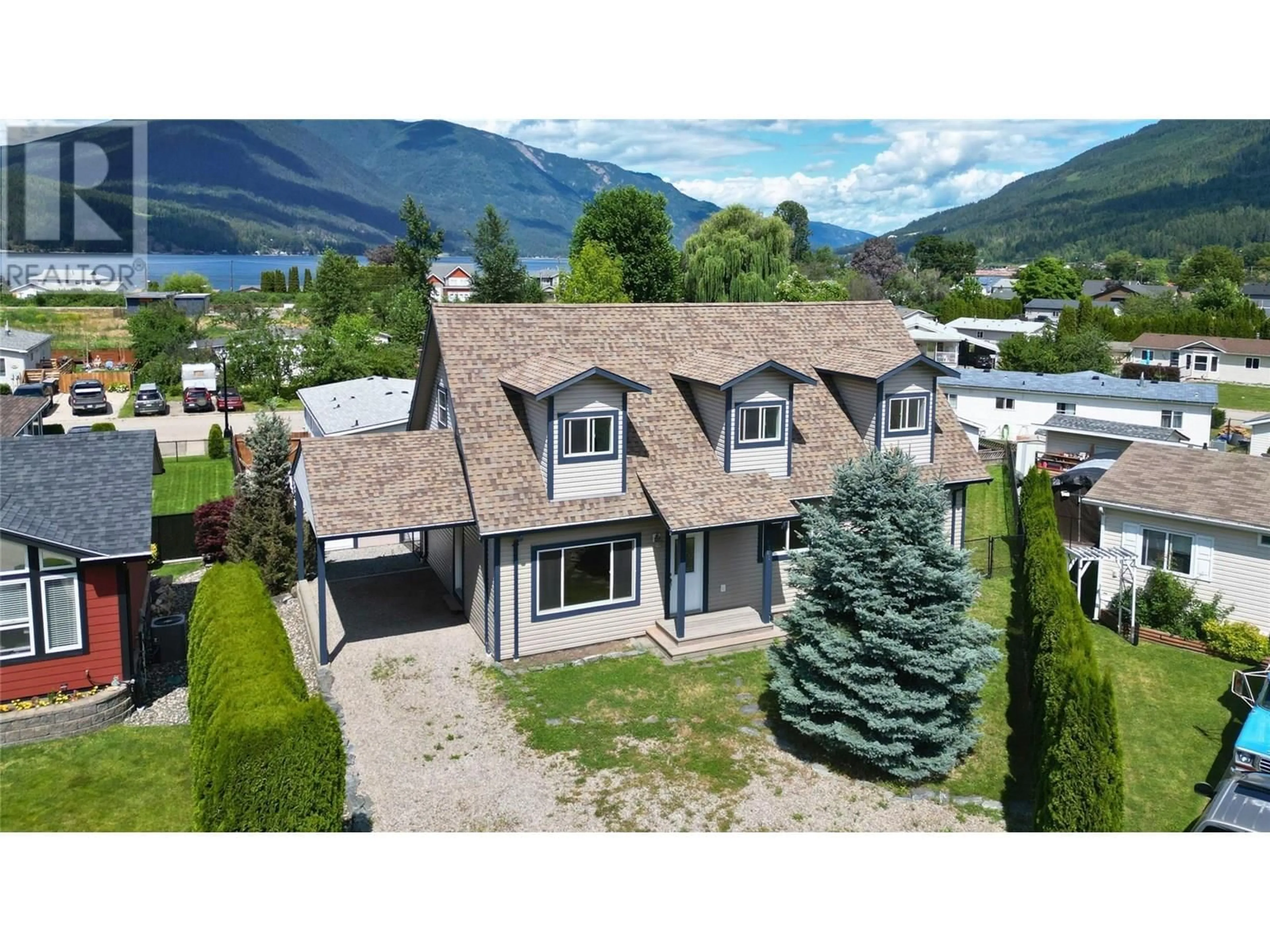A pic from outside/outdoor area/front of a property/back of a property/a pic from drone, mountain view for 7281 46 STREET NORTHEAST, Salmon Arm British Columbia V1E2B3