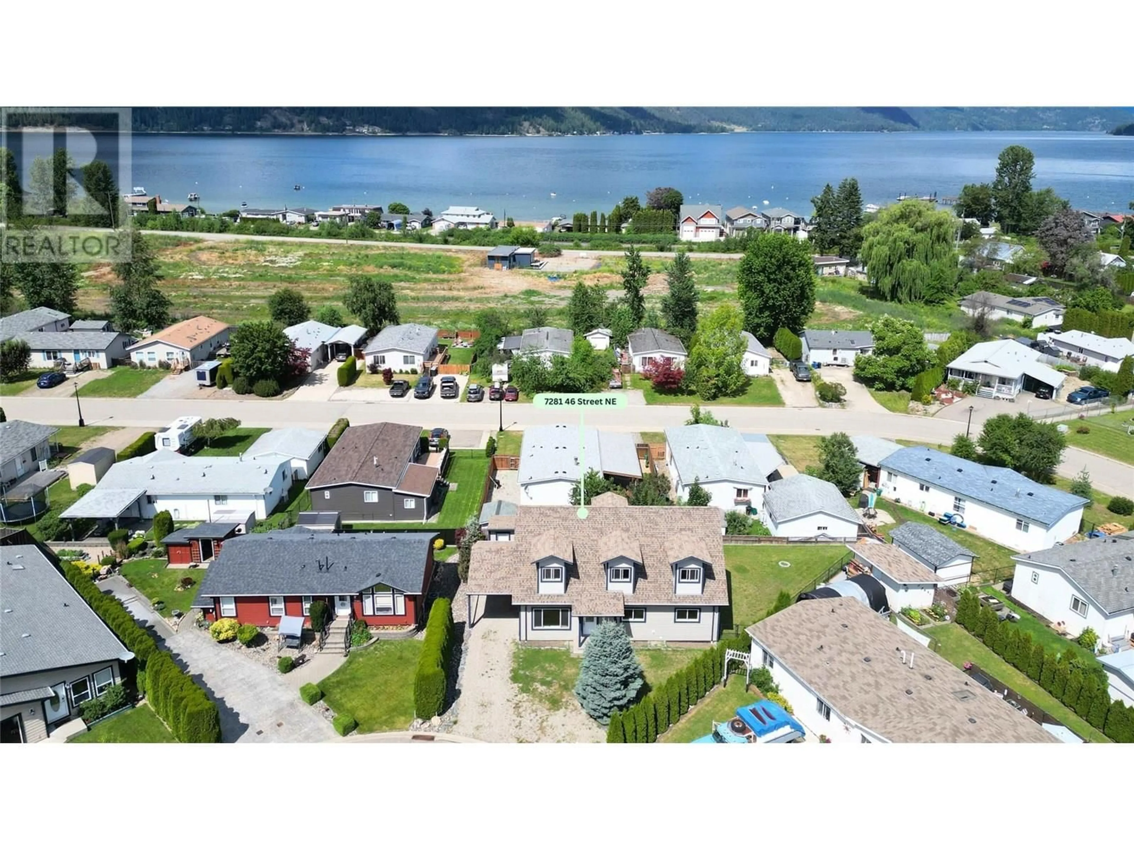 A pic from outside/outdoor area/front of a property/back of a property/a pic from drone, water/lake/river/ocean view for 7281 46 STREET NORTHEAST, Salmon Arm British Columbia V1E2B3