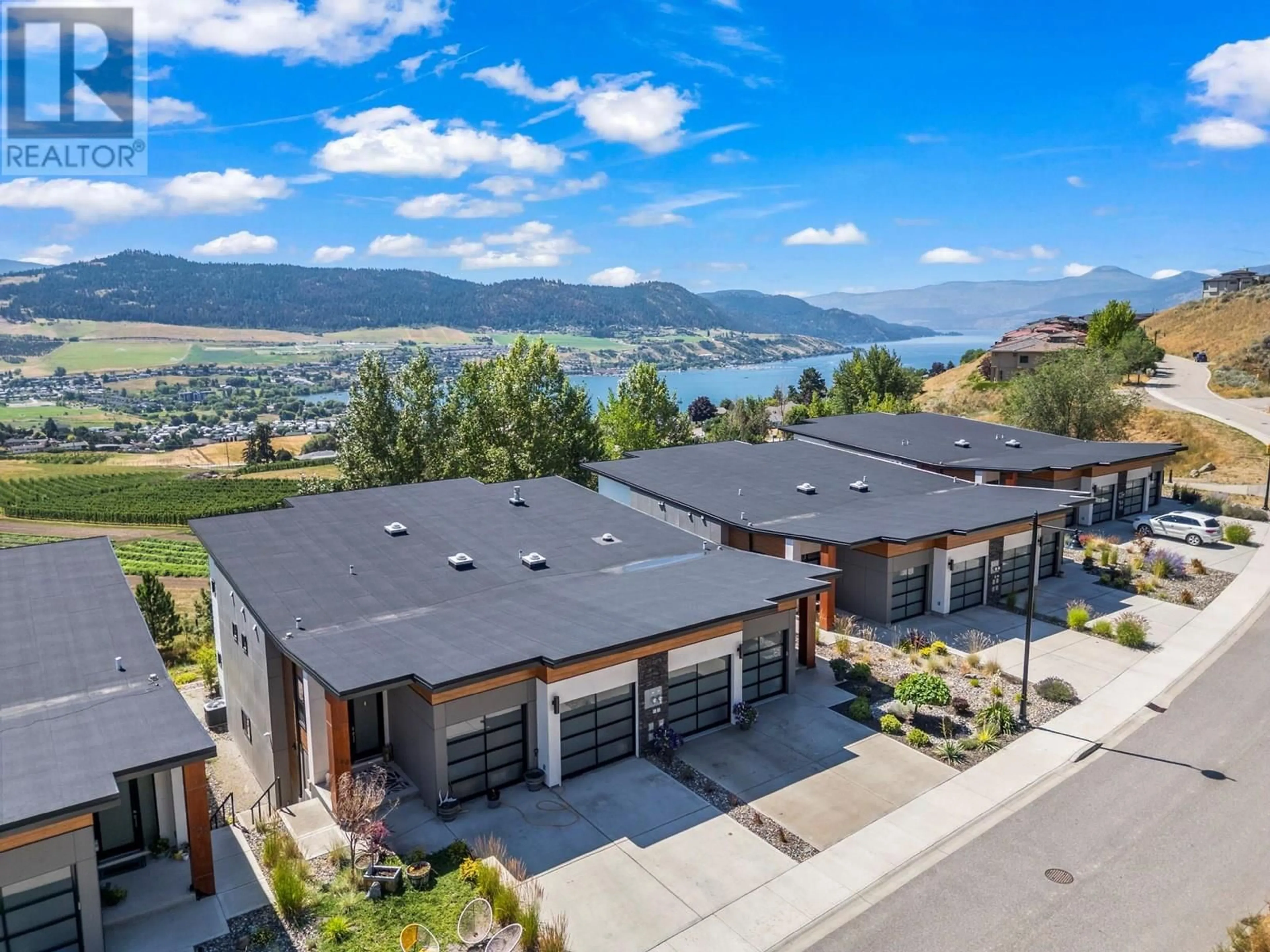 A pic from outside/outdoor area/front of a property/back of a property/a pic from drone, water/lake/river/ocean view for 188 VINEYARD WAY, Vernon British Columbia V1H1Z7