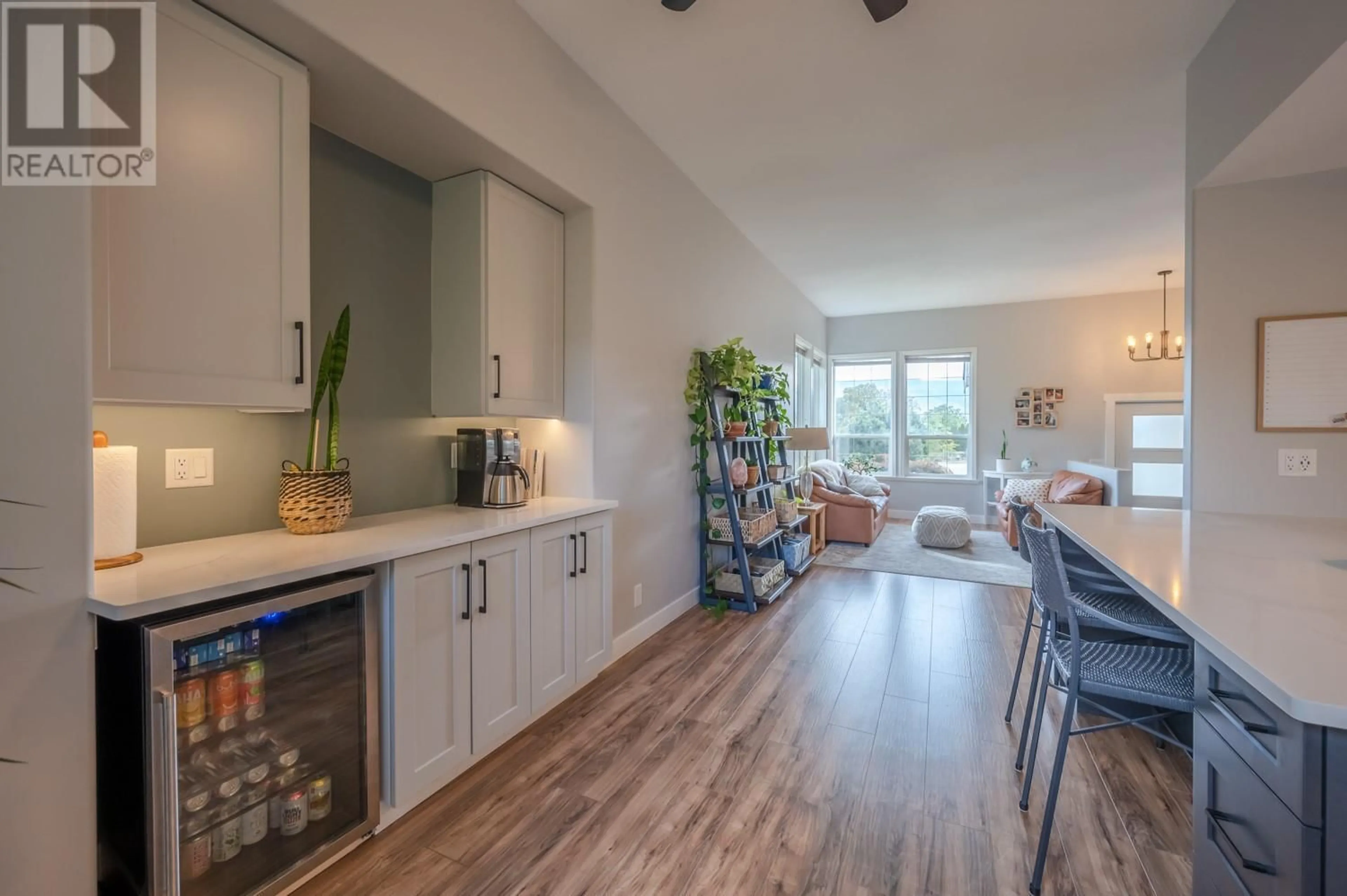 Open concept kitchen, wood/laminate floor for 12816 SCHAEFFER CRESCENT, Summerland British Columbia V0H1Z4
