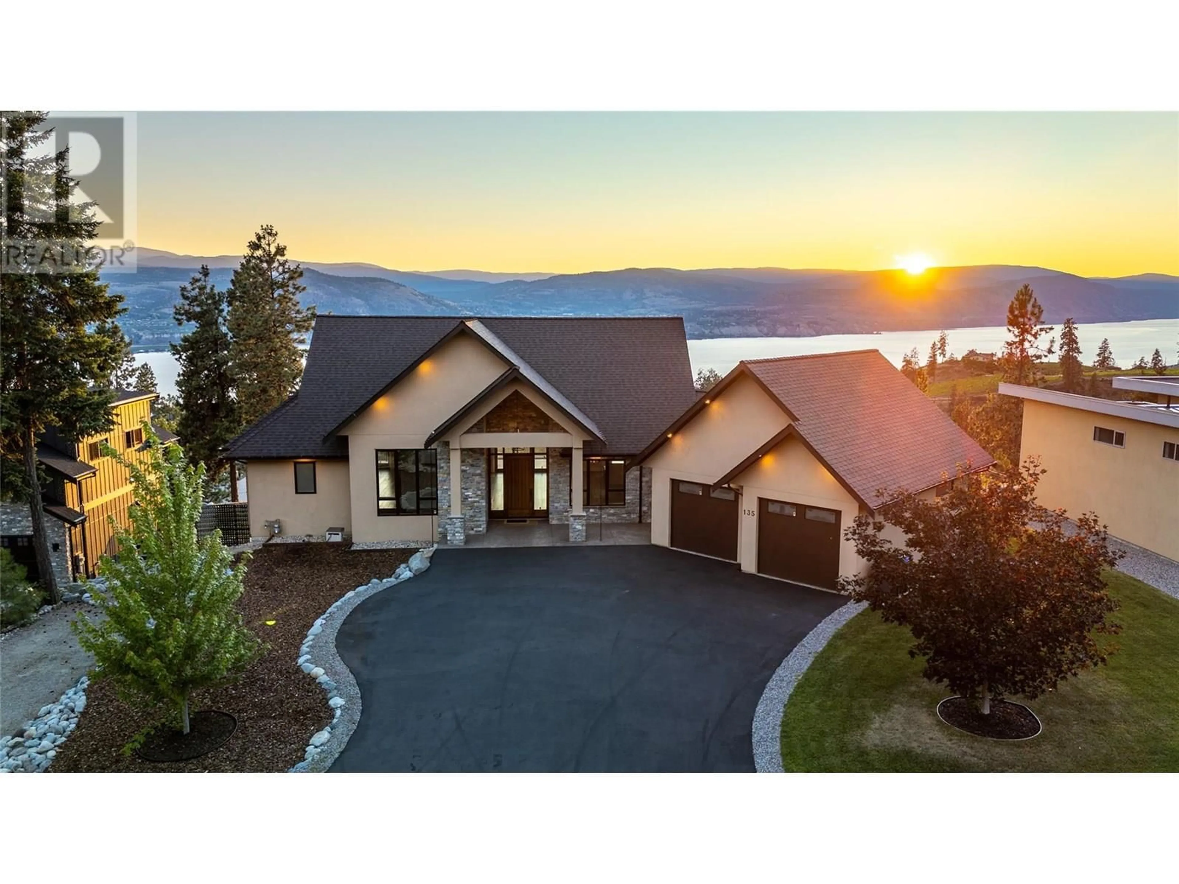 A pic from outside/outdoor area/front of a property/back of a property/a pic from drone, water/lake/river/ocean view for 135 FLAGSTONE RISE, Naramata British Columbia V0H1N1