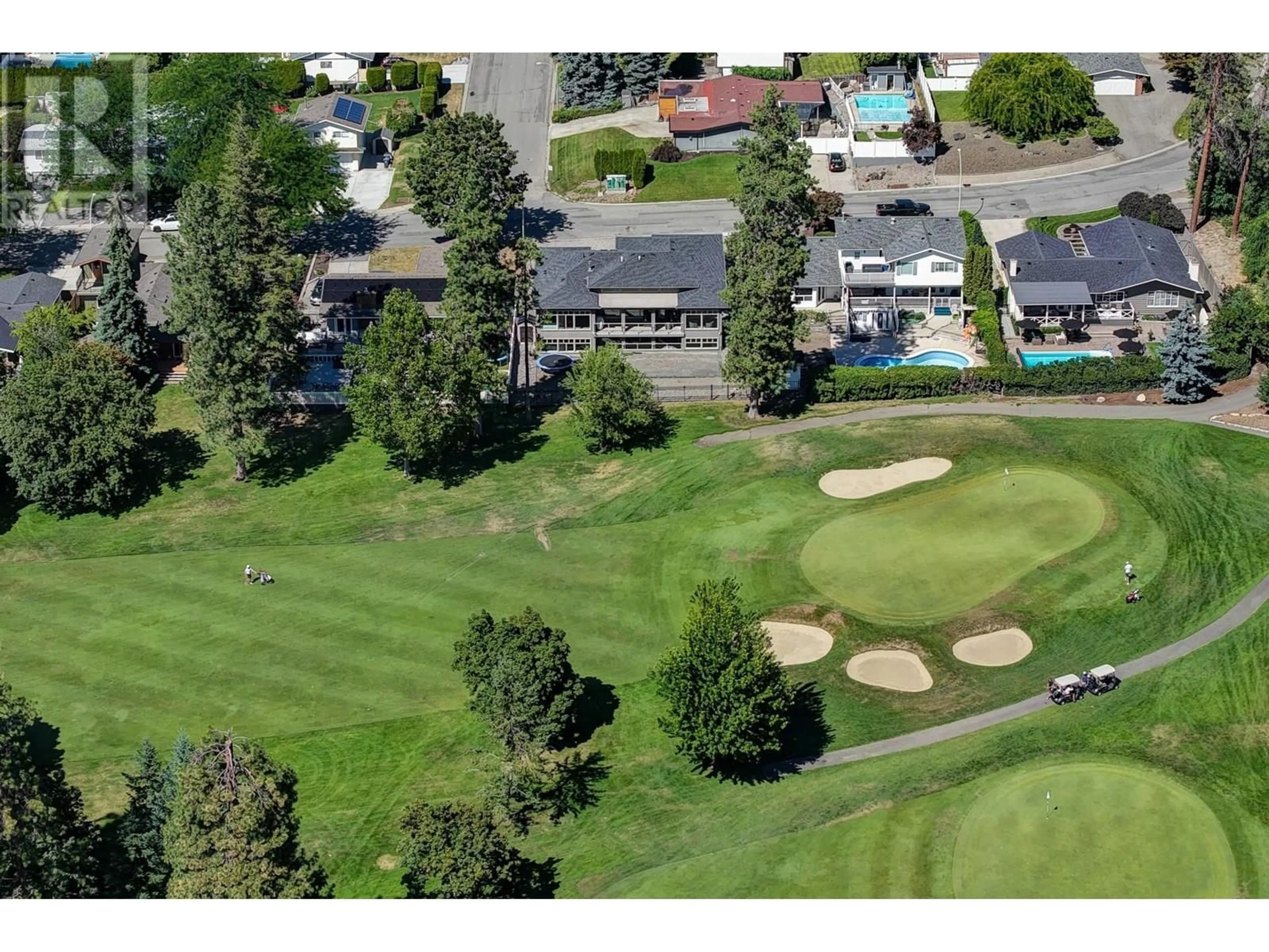 A pic from outside/outdoor area/front of a property/back of a property/a pic from drone, mountain view for 2045 ST. ANDREWS DRIVE, Kelowna British Columbia V1Y4T6