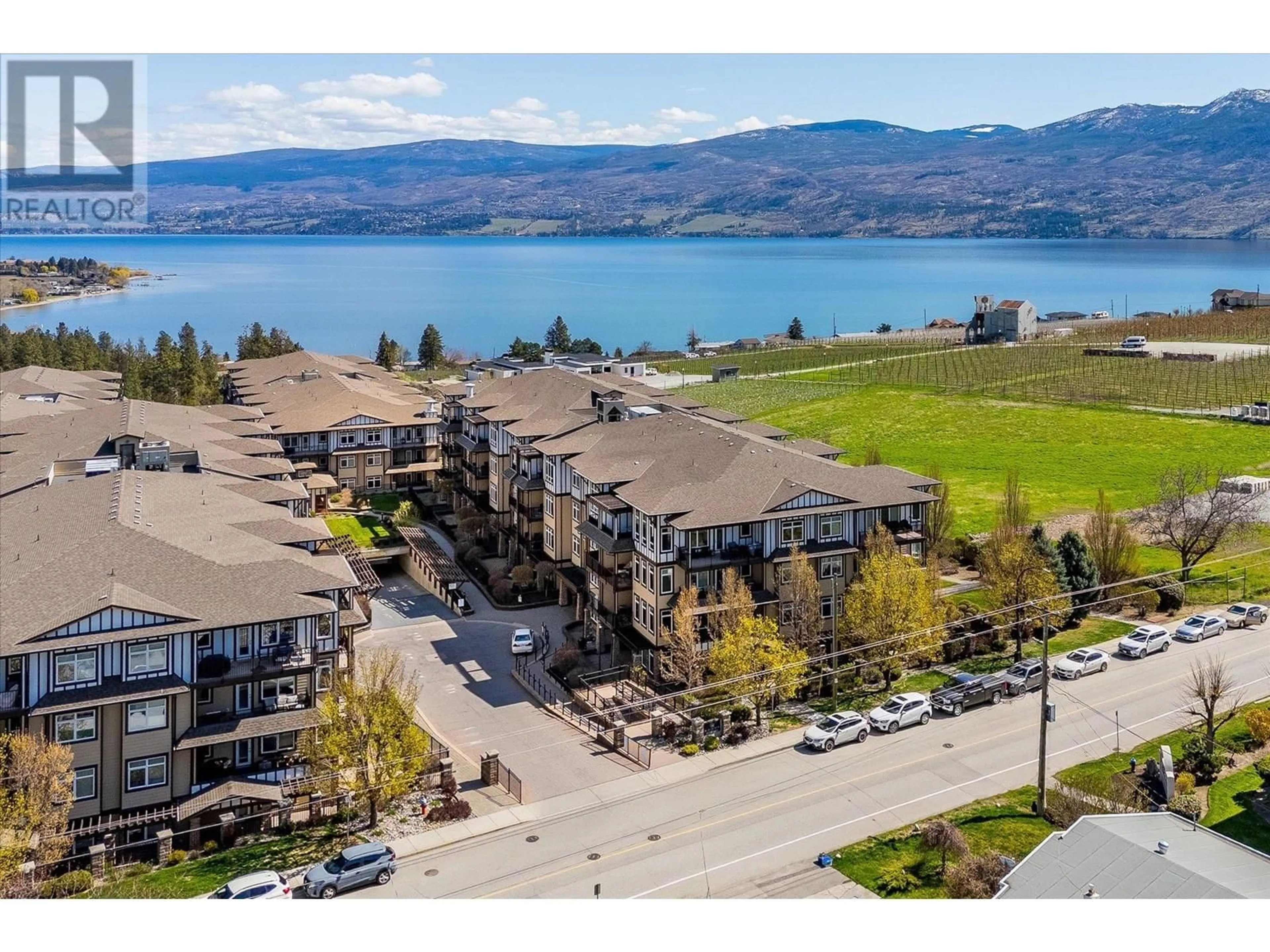 A pic from outside/outdoor area/front of a property/back of a property/a pic from drone, water/lake/river/ocean view for 2110 - 3843 BROWN ROAD, West Kelowna British Columbia V4T2J3