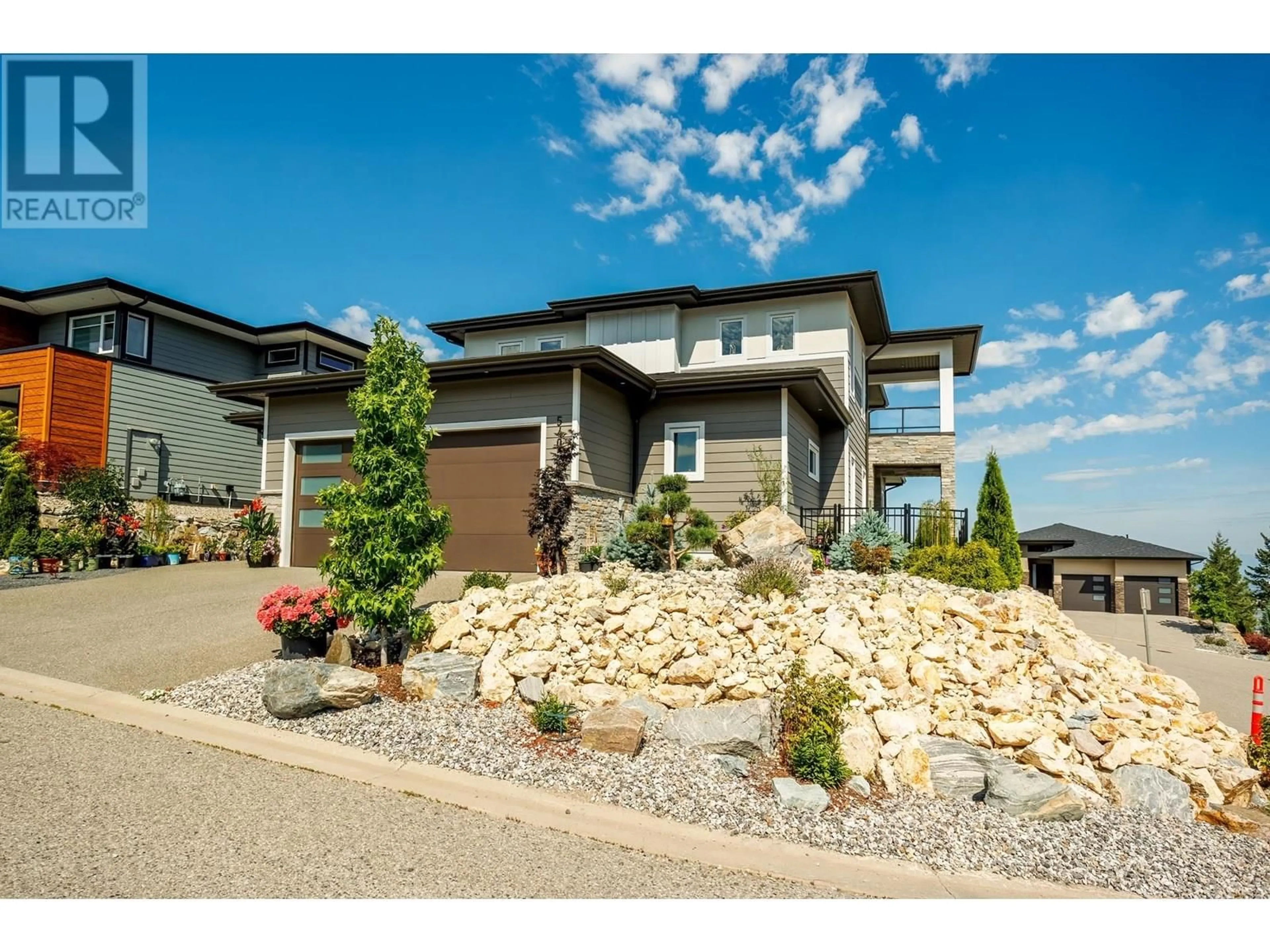 Home with brick exterior material, street for 540 BARRA LANE, Kelowna British Columbia V1P1T1
