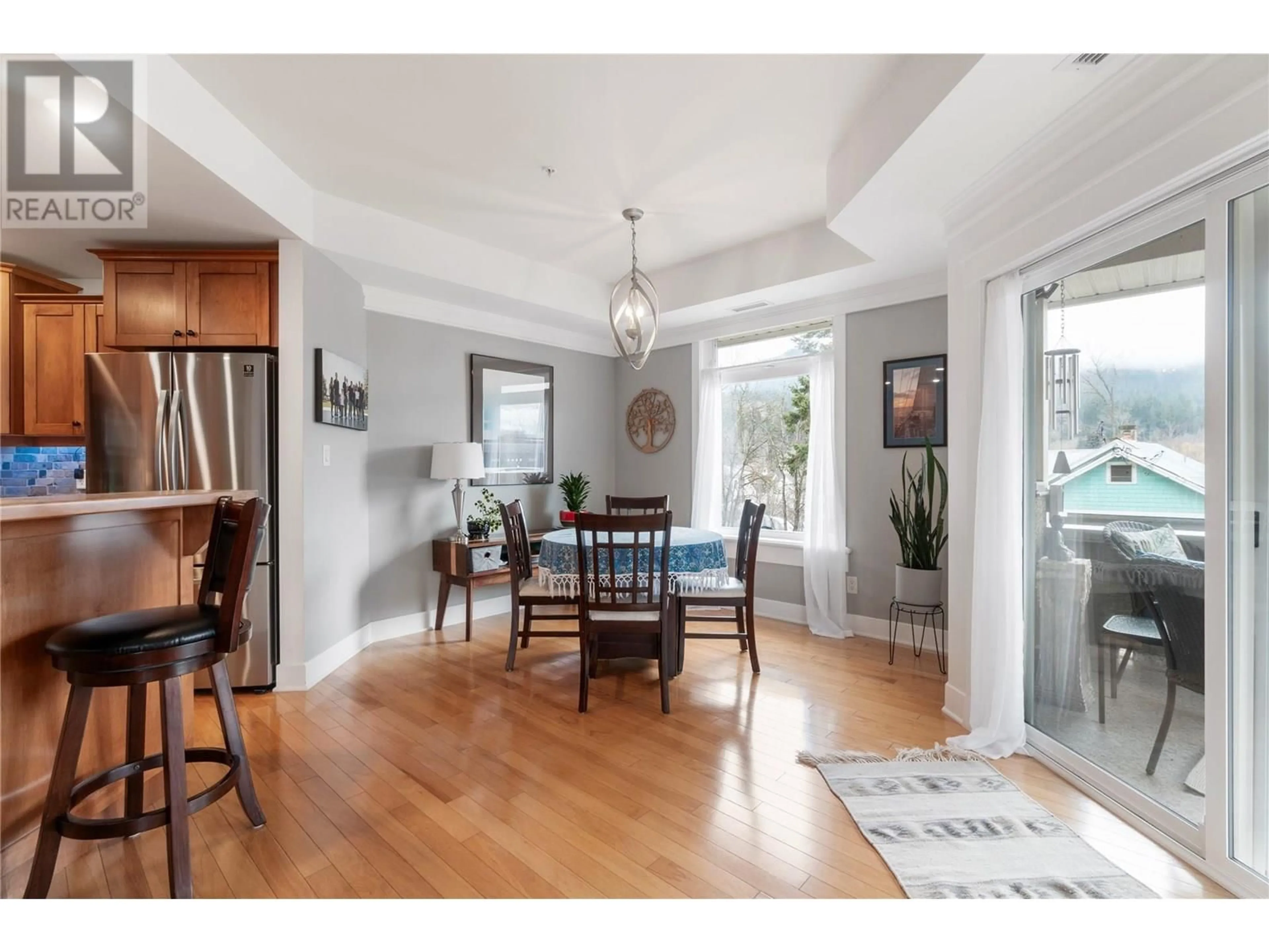 Dining room, wood/laminate floor for 104 - 611 SHUSWAP STREET SOUTHWEST, Salmon Arm British Columbia V1E0A2