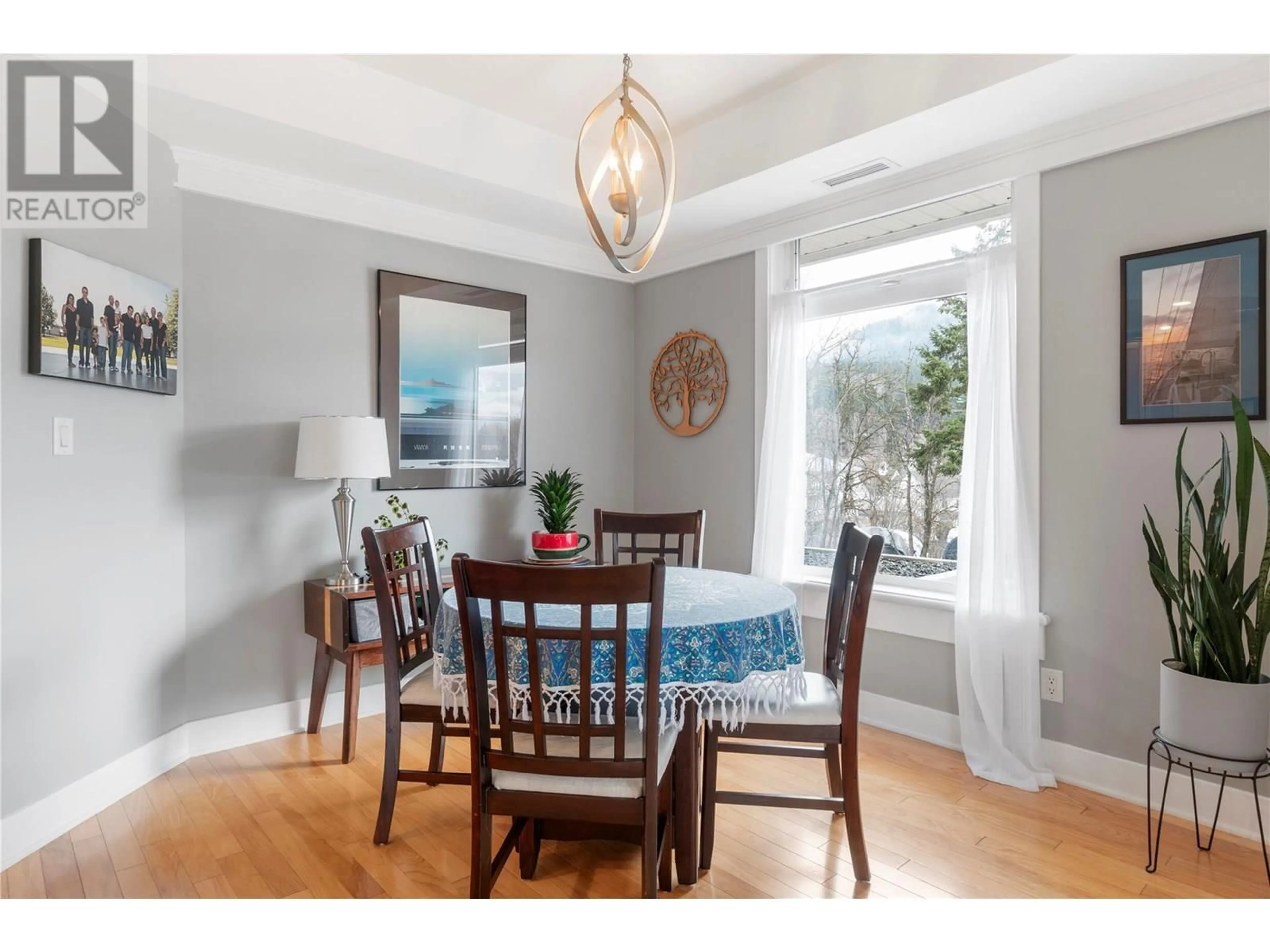 Dining room, wood/laminate floor for 104 - 611 SHUSWAP STREET SOUTHWEST, Salmon Arm British Columbia V1E0A2