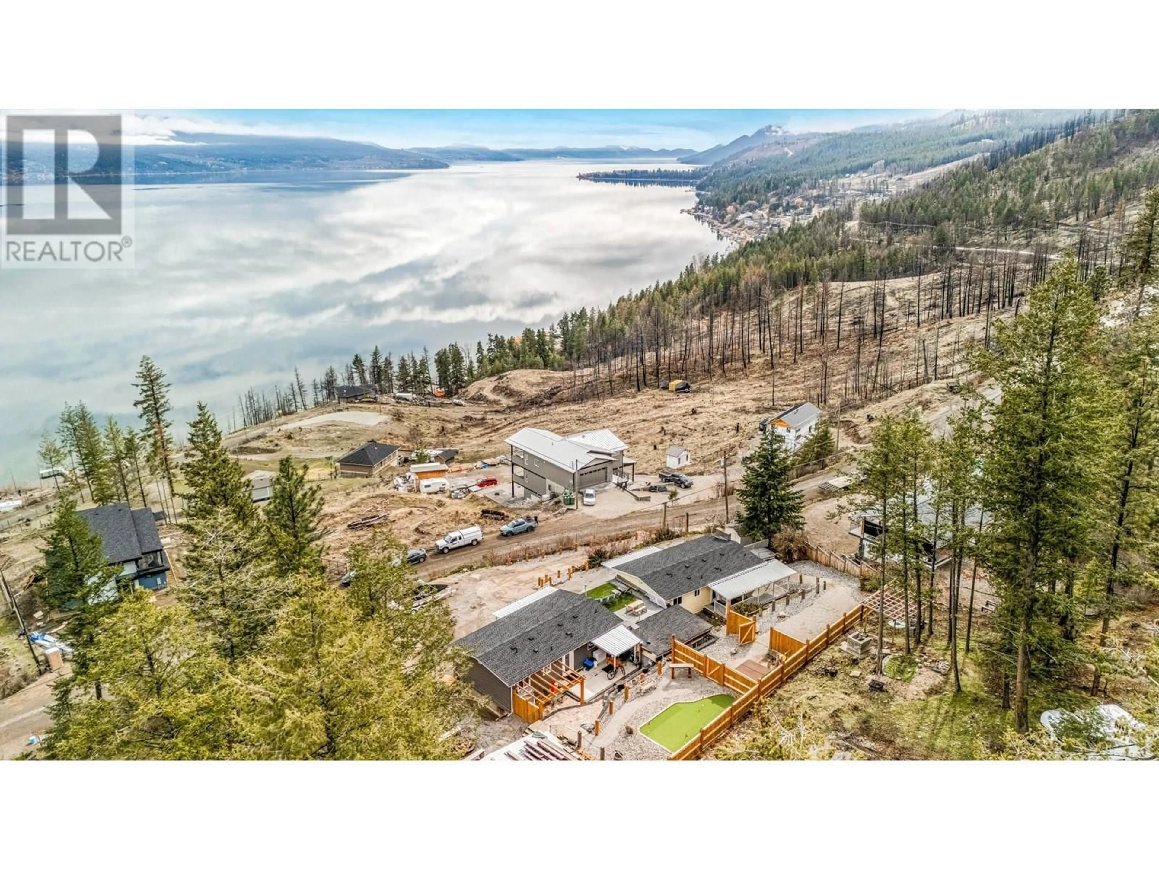 A pic from outside/outdoor area/front of a property/back of a property/a pic from drone, unknown for 494 KILLARNEY WAY, Vernon British Columbia V1H2C6