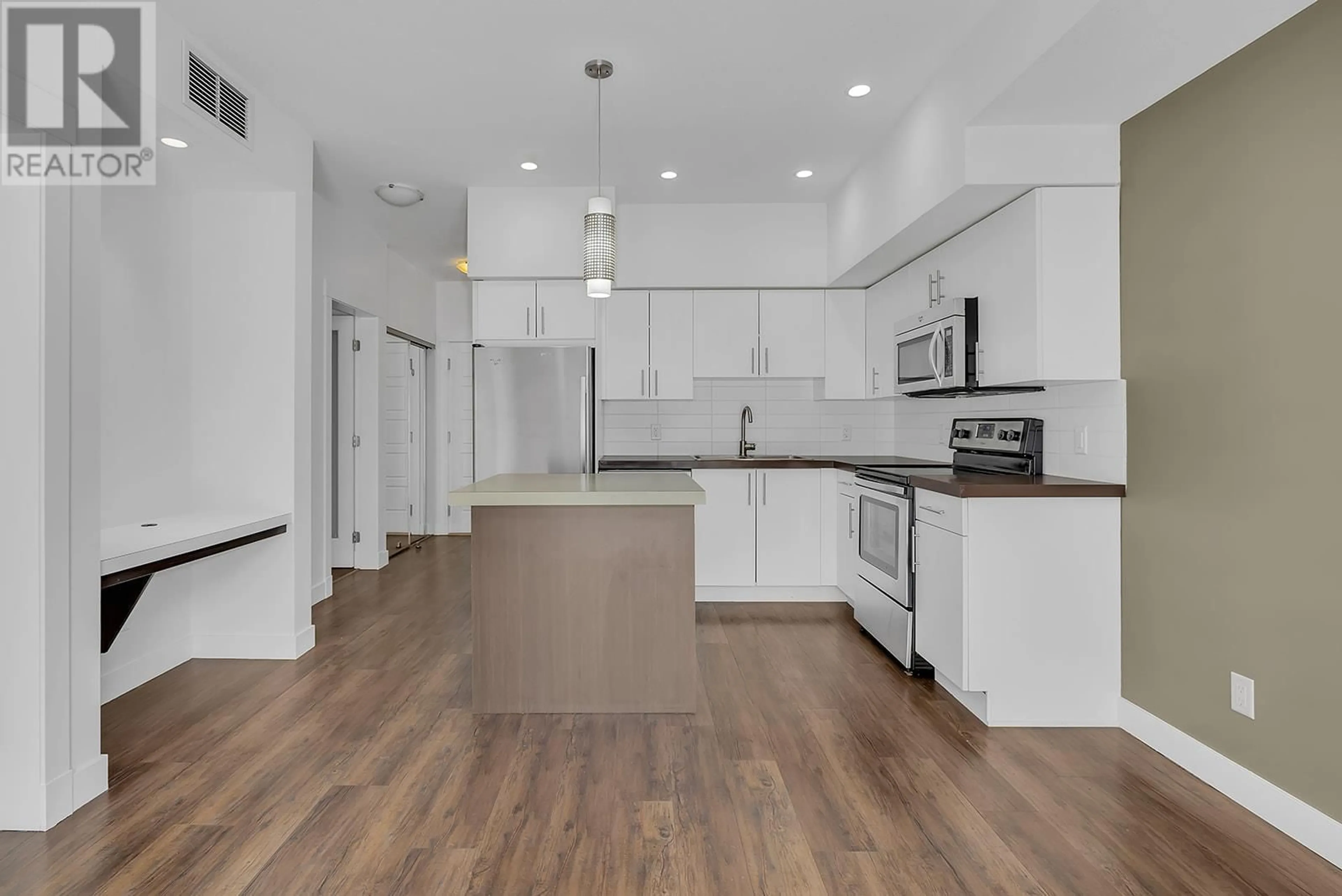 Open concept kitchen, unknown for 210 - 975 ACADEMY WAY, Kelowna British Columbia V1V3C8