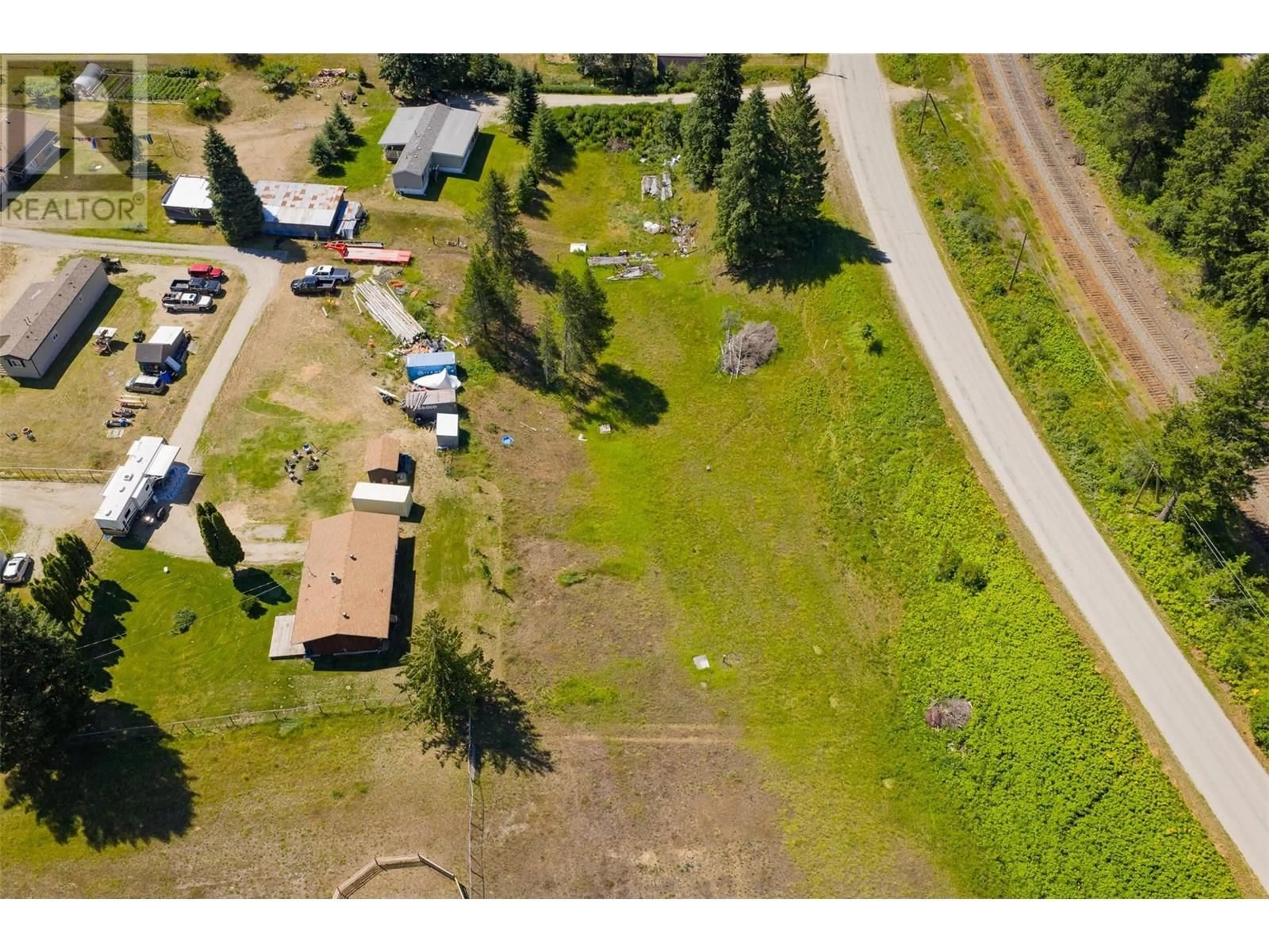 A pic from outside/outdoor area/front of a property/back of a property/a pic from drone, street for 2543 ALEXIS ROAD, Shoreacres British Columbia V1N3W3