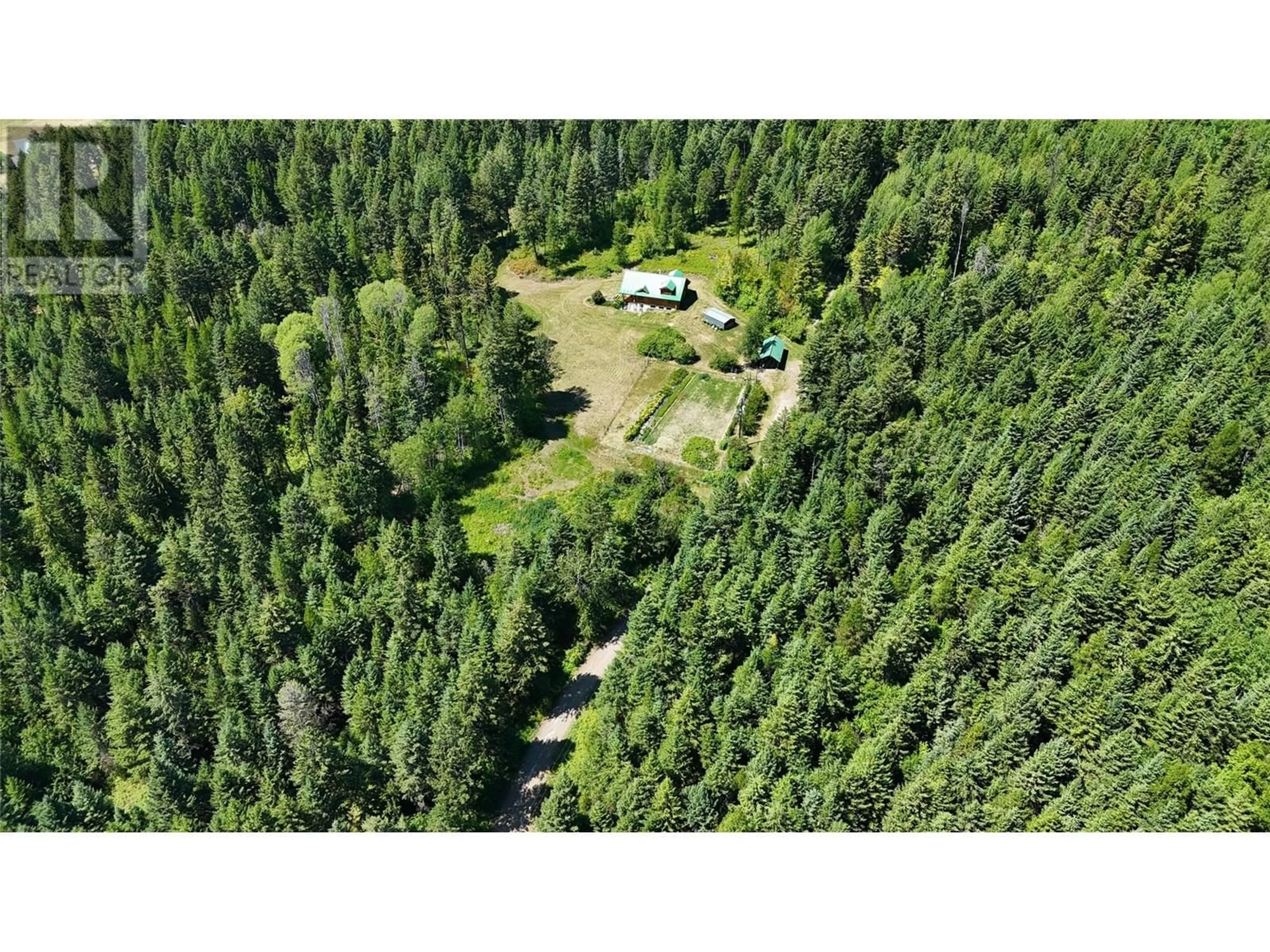 A pic from outside/outdoor area/front of a property/back of a property/a pic from drone, forest/trees view for 5200 HARDY MOUNTAIN ROAD, Grand Forks British Columbia V0H1H2