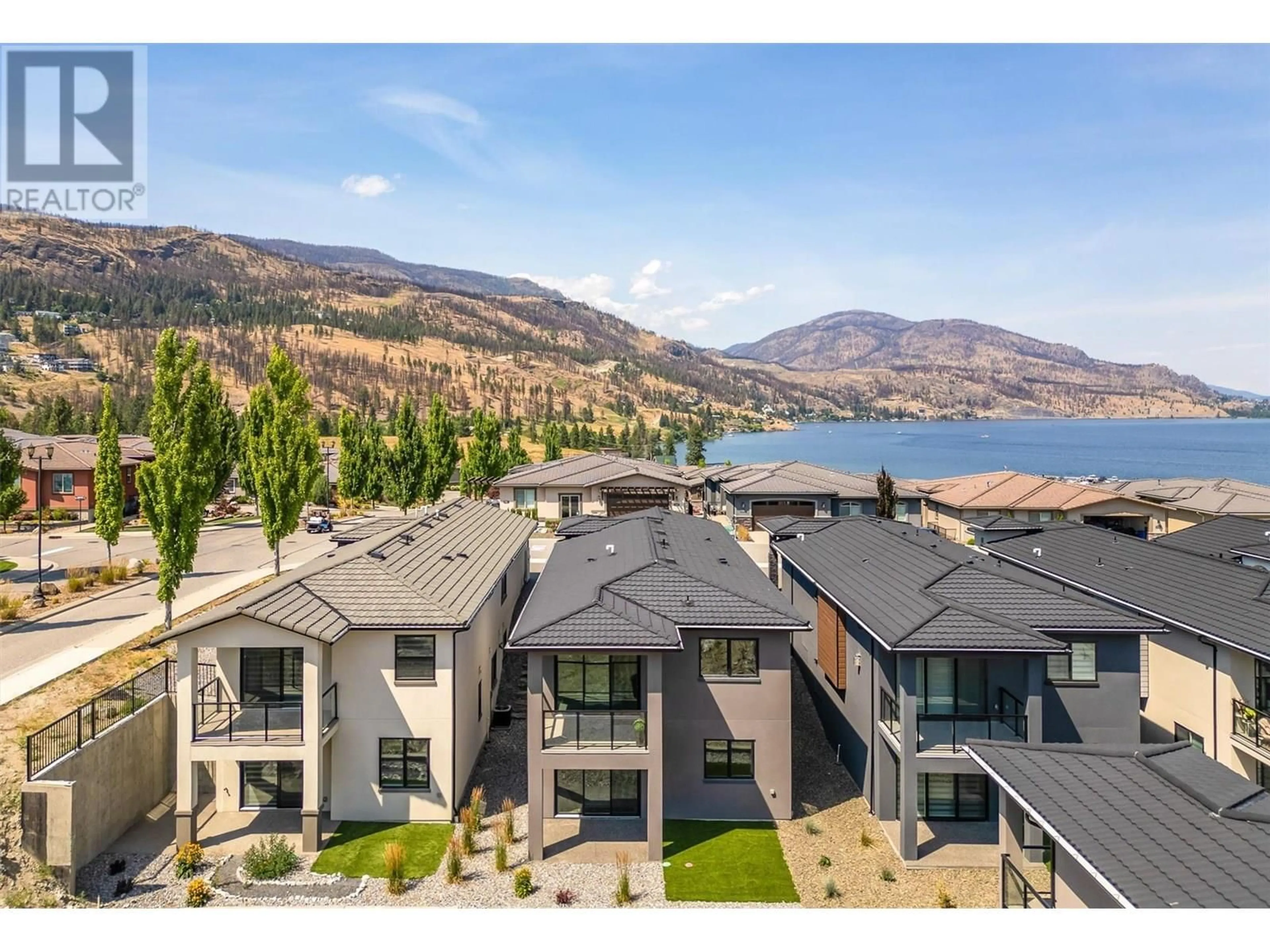 A pic from outside/outdoor area/front of a property/back of a property/a pic from drone, water/lake/river/ocean view for 1795 VIEWPOINT DRIVE, Kelowna British Columbia V1Z4E1