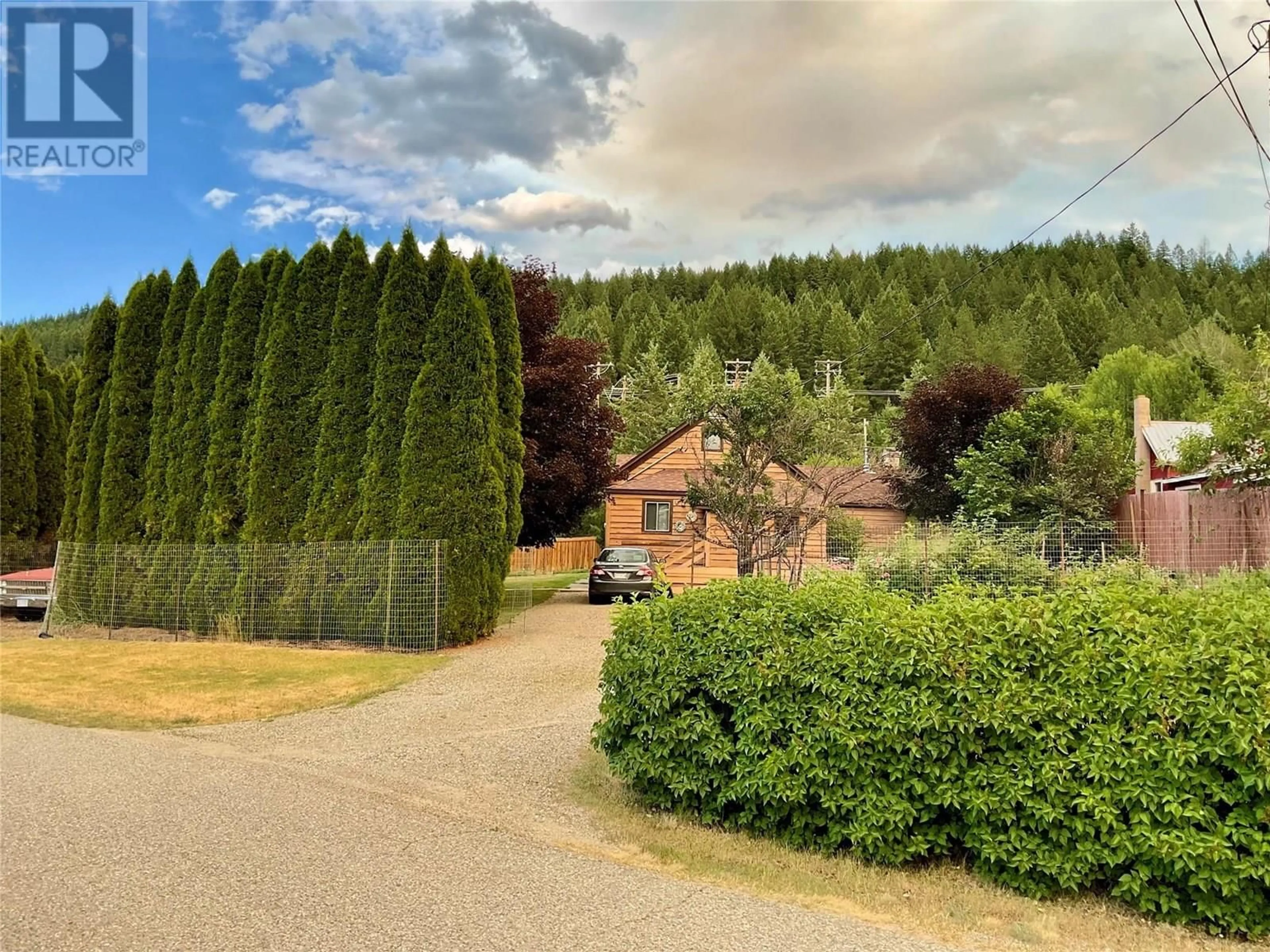 A pic from outside/outdoor area/front of a property/back of a property/a pic from drone, forest/trees view for 555 EVERETTE AVENUE, Greenwood British Columbia V0H1J0