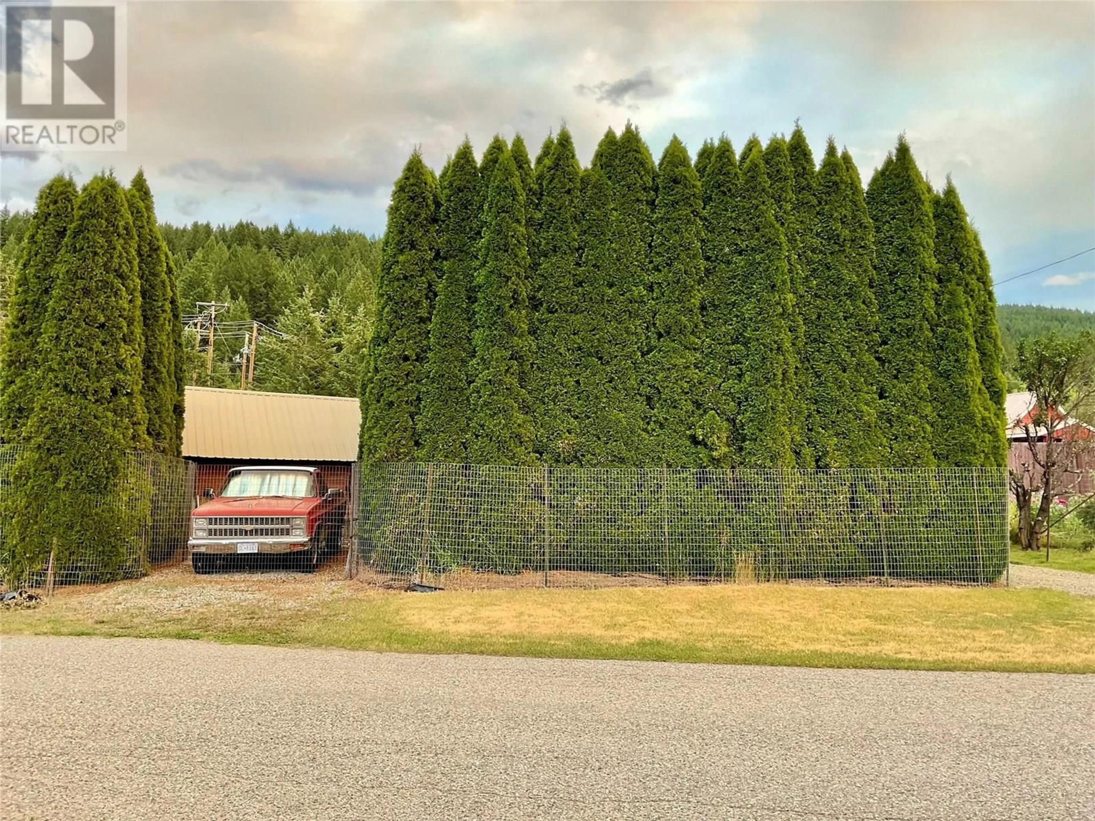 A pic from outside/outdoor area/front of a property/back of a property/a pic from drone, forest/trees view for 555 EVERETTE AVENUE, Greenwood British Columbia V0H1J0