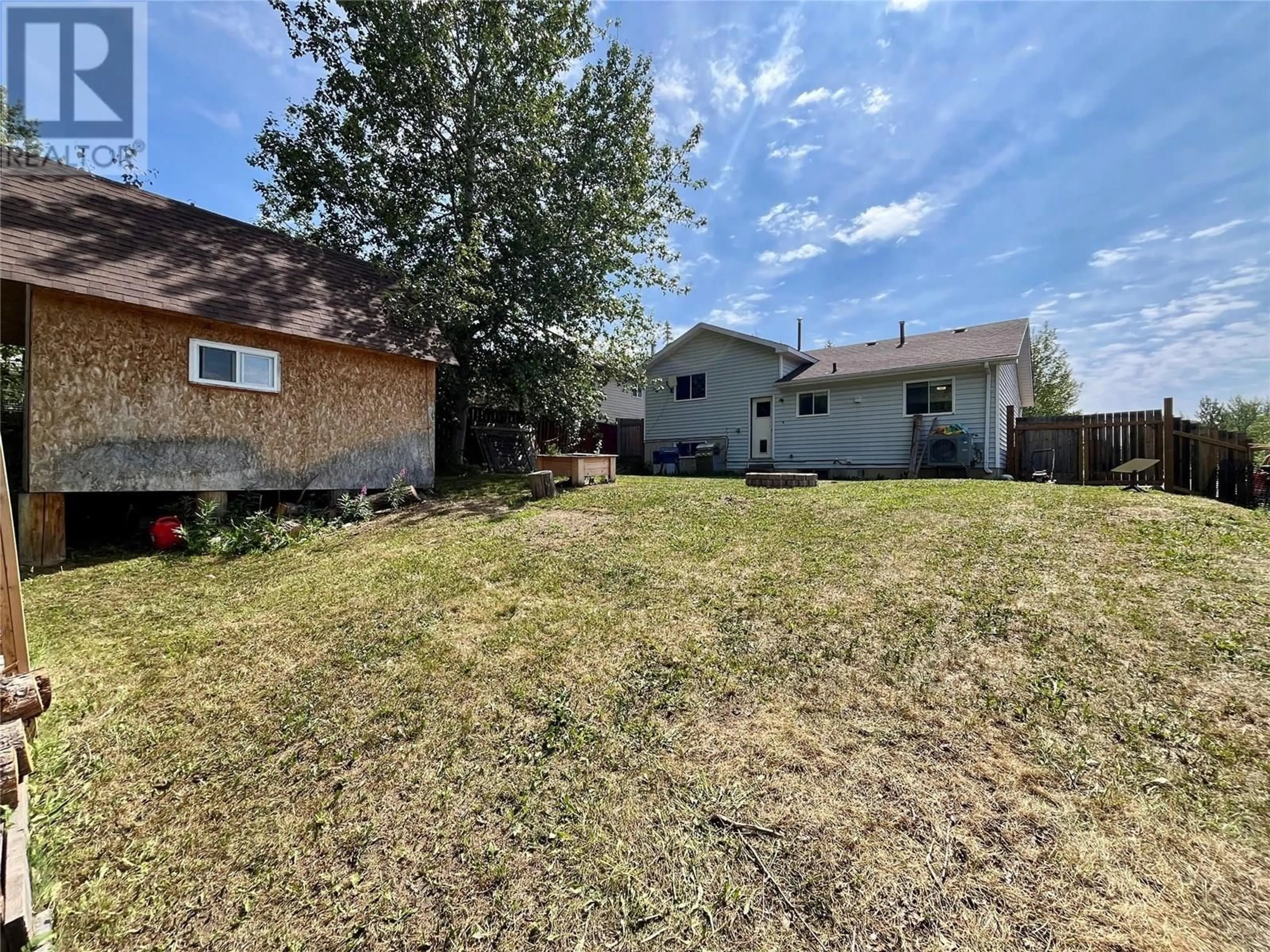 A pic from outside/outdoor area/front of a property/back of a property/a pic from drone, street for 140 WAPITI CRESCENT, Tumbler Ridge British Columbia V0C2W0
