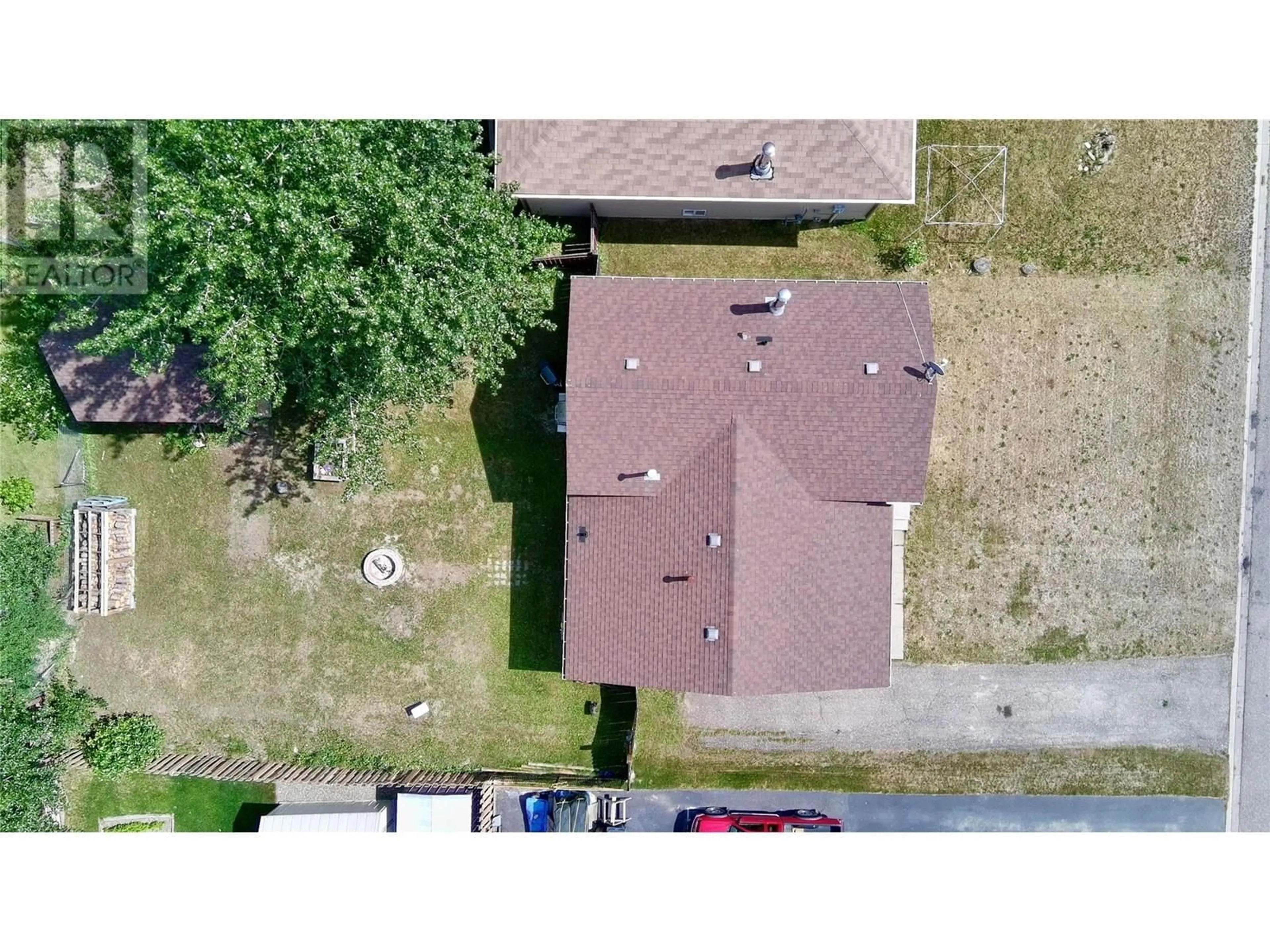 A pic from outside/outdoor area/front of a property/back of a property/a pic from drone, street for 140 WAPITI CRESCENT, Tumbler Ridge British Columbia V0C2W0