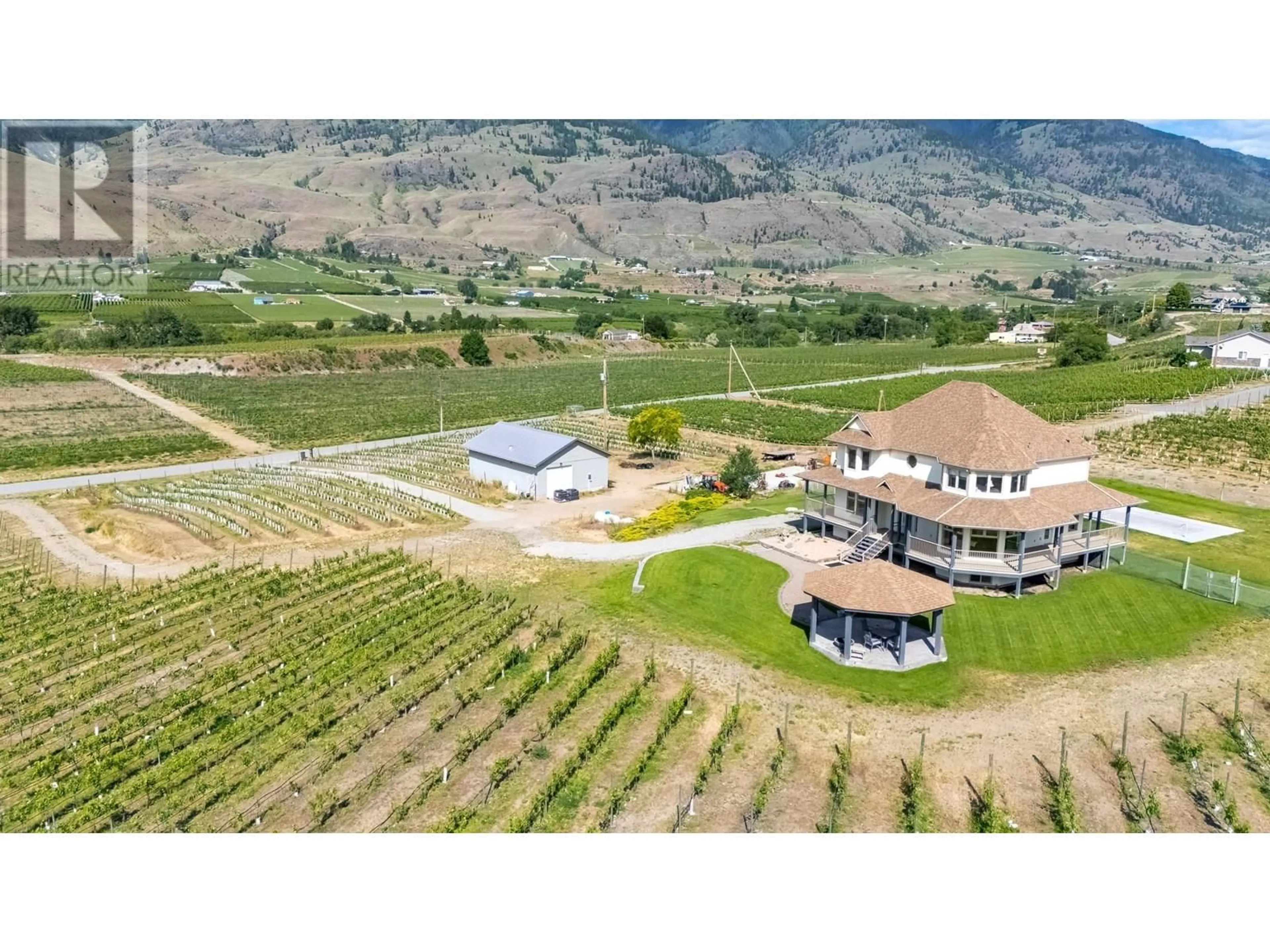 A pic from outside/outdoor area/front of a property/back of a property/a pic from drone, mountain view for 4535 RYEGRASS ROAD, Oliver British Columbia V0H1T0
